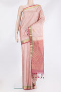 Pure Silk Rose Gold Kanchipuram Saree with Zari Butta on the body and Zari Border.  displayed on a mannequin