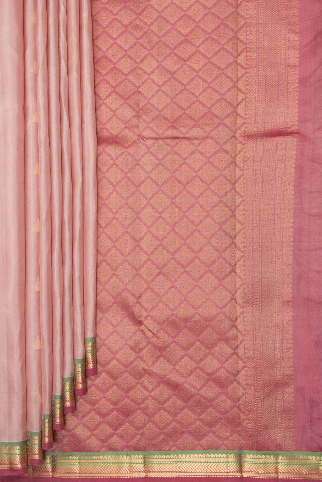 Pleats and pallu of Pure Silk Rose Gold Kanchipuram Saree with Zari Butta on the body and Zari Border. 