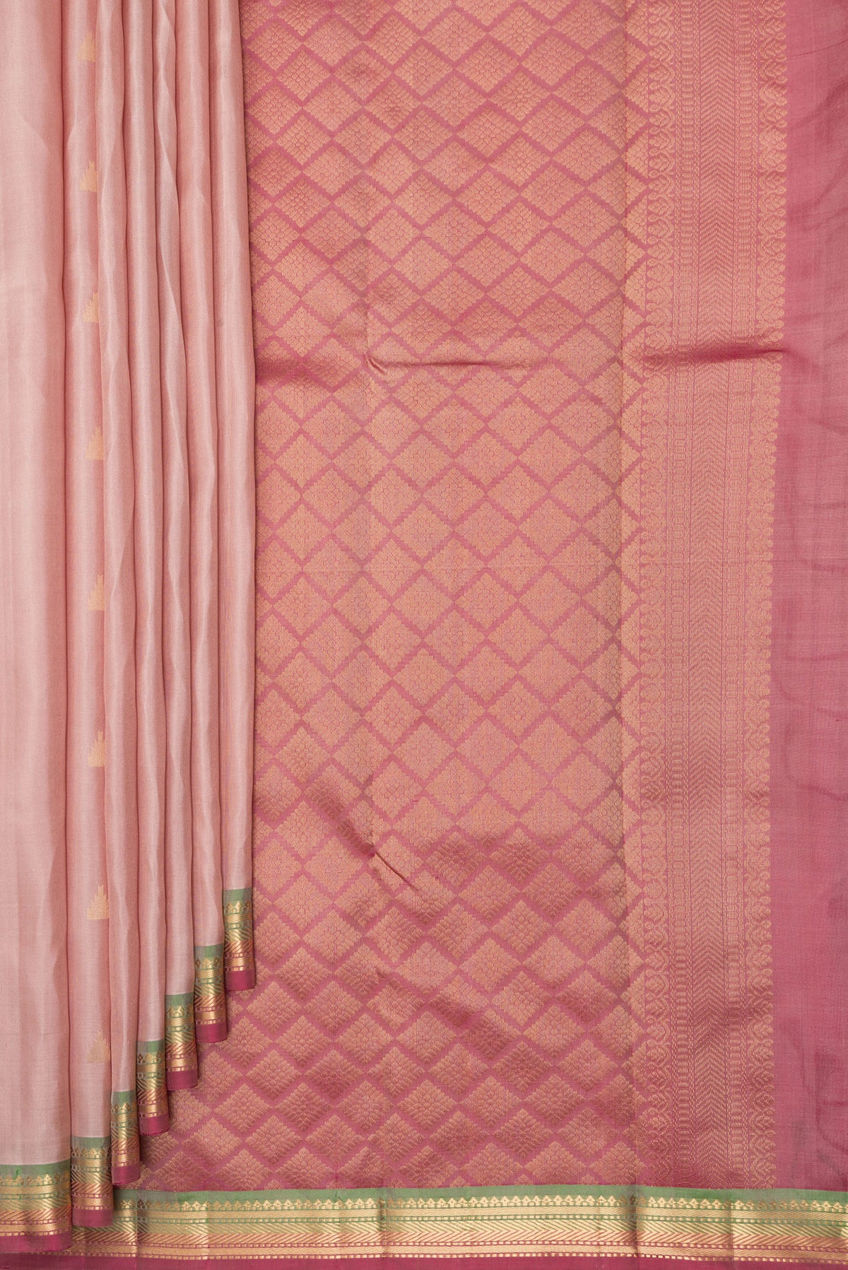 Pleats and pallu of Pure Silk Rose Gold Kanchipuram Saree with Zari Butta on the body and Zari Border. 