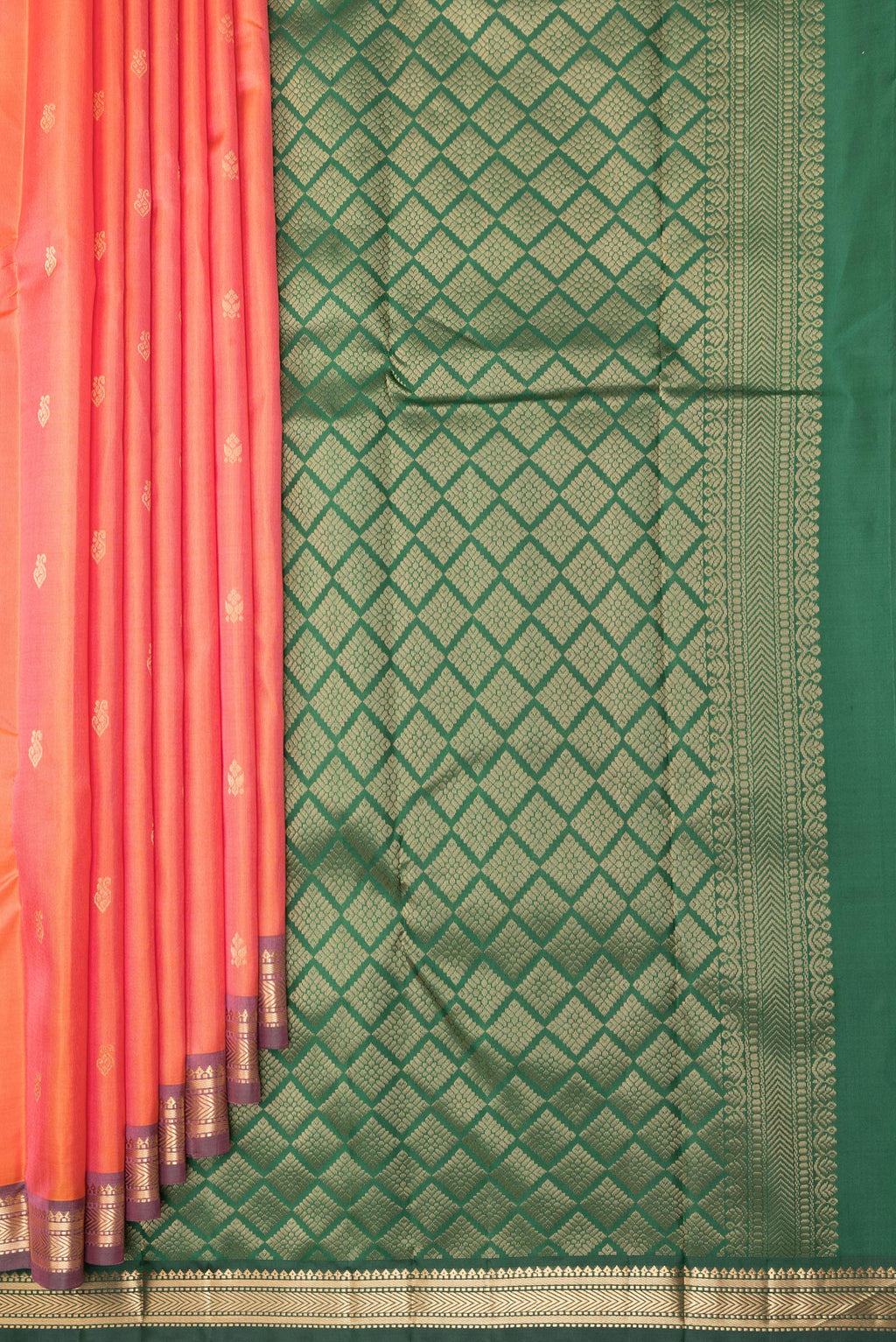 Pleats and pallu of Pure Silk Golden Peach Kanchipuram Saree with Zari Butta on the body and Zari Border. 