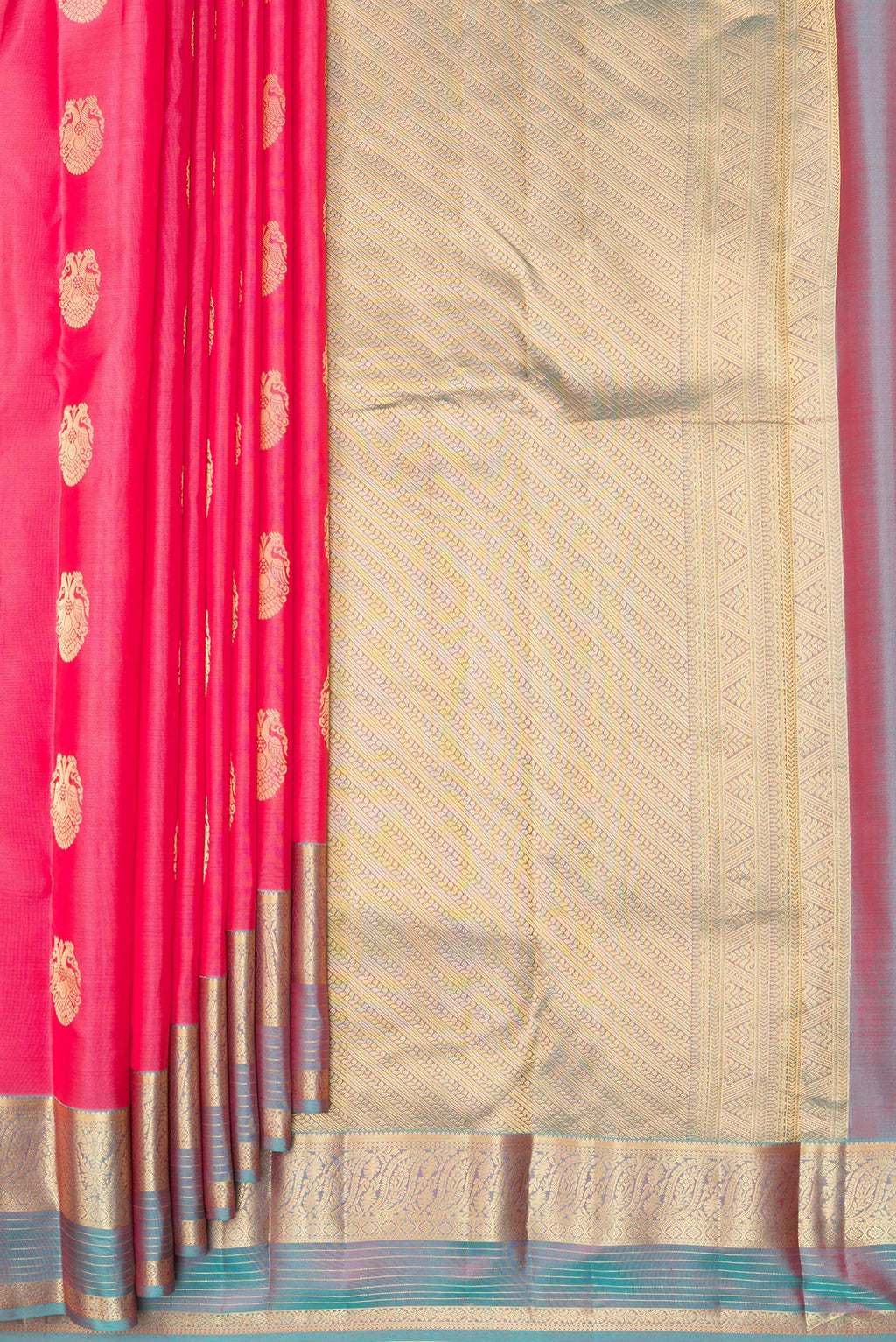 Pleats and pallu of Pure Silk Coral Kanjivaram Saree with Zari Butta on the body and Zari Border. 