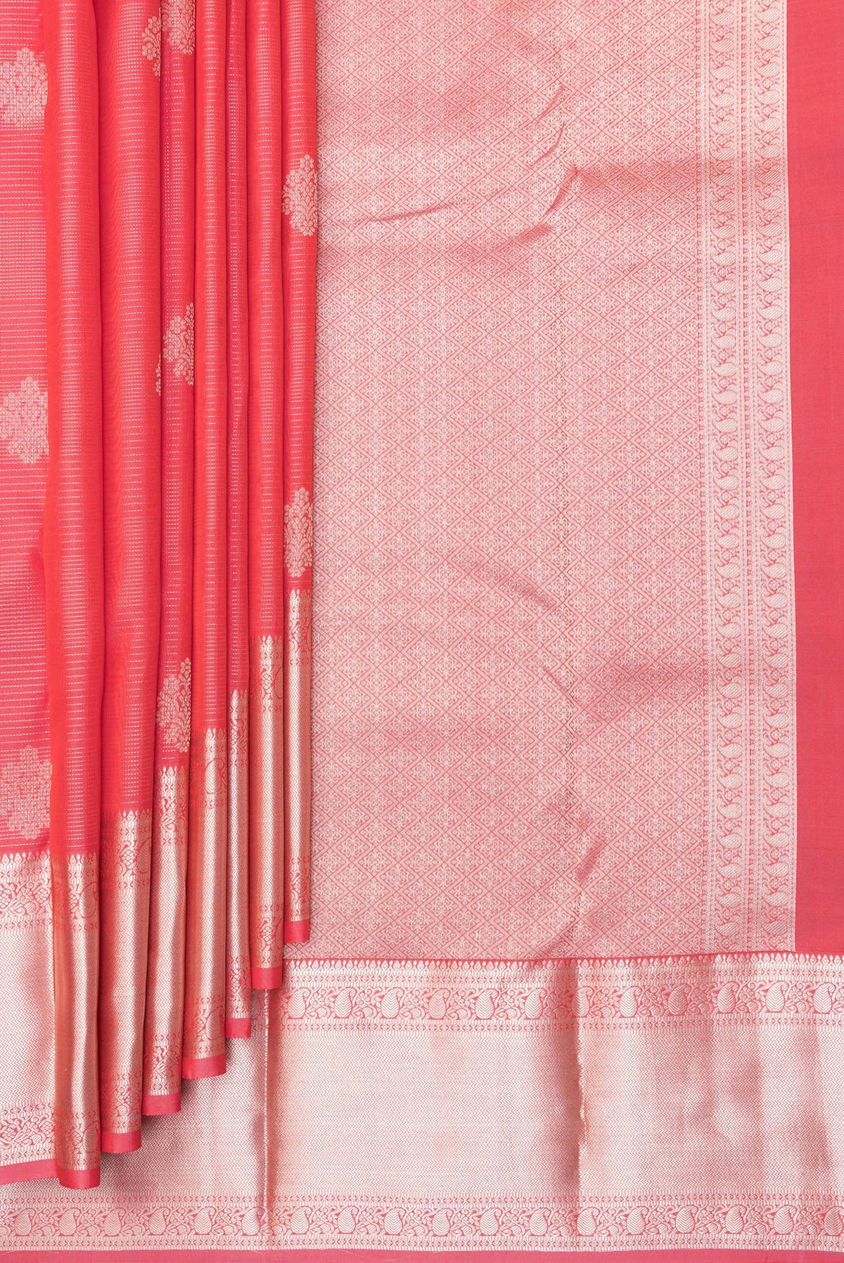 Pleats and pallu of Pure Silk Orange Kanchipuram Saree with Stripes on the body and Zari Border. 