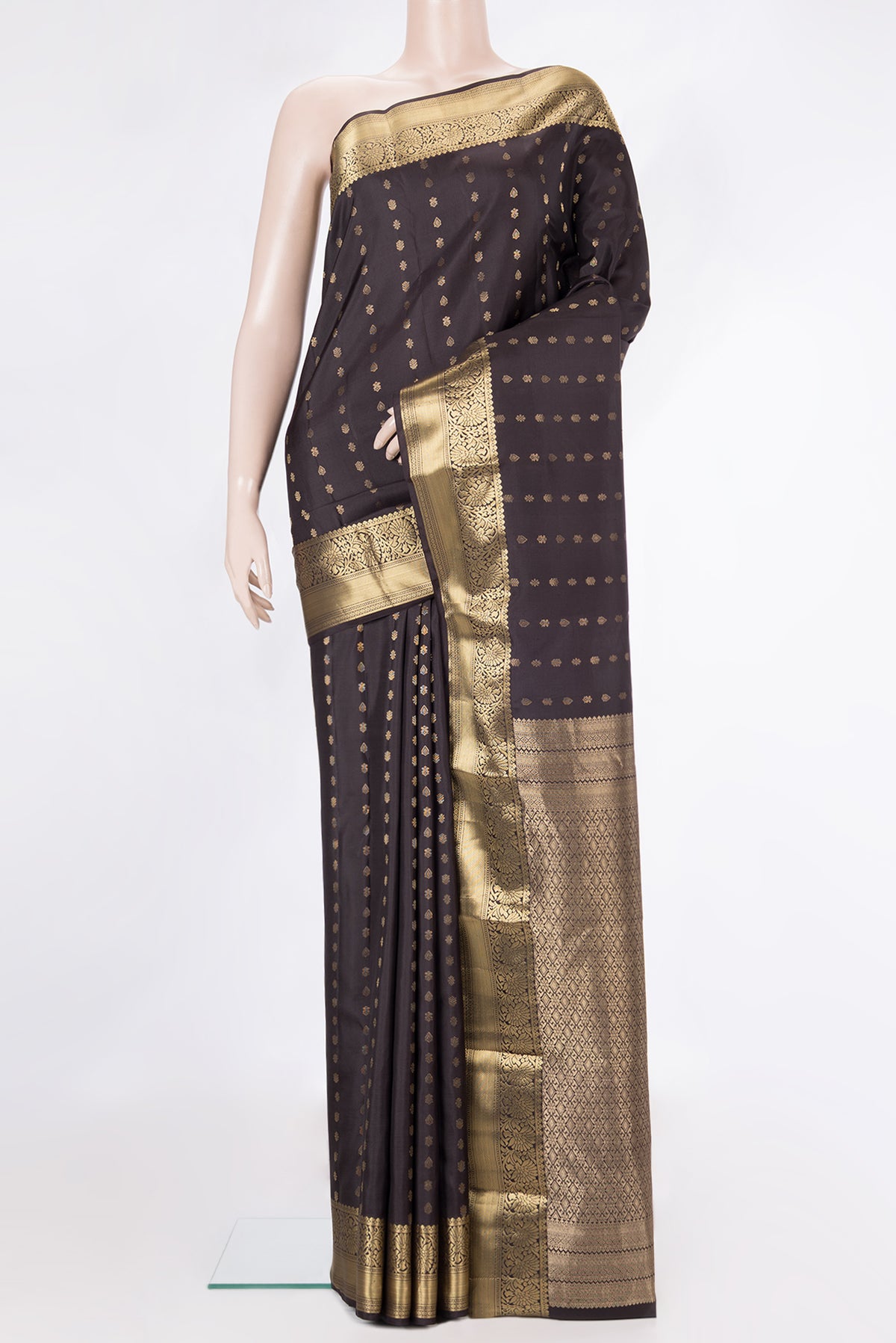 Pure Silk Coffee Brown Kanchipuram Saree with Zari Butta on the body and Zari Border.  displayed on a mannequin