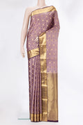 Pure Silk Rose Gold Kanchipuram Saree with Checked design on the body and Zari Border.  displayed on a mannequin