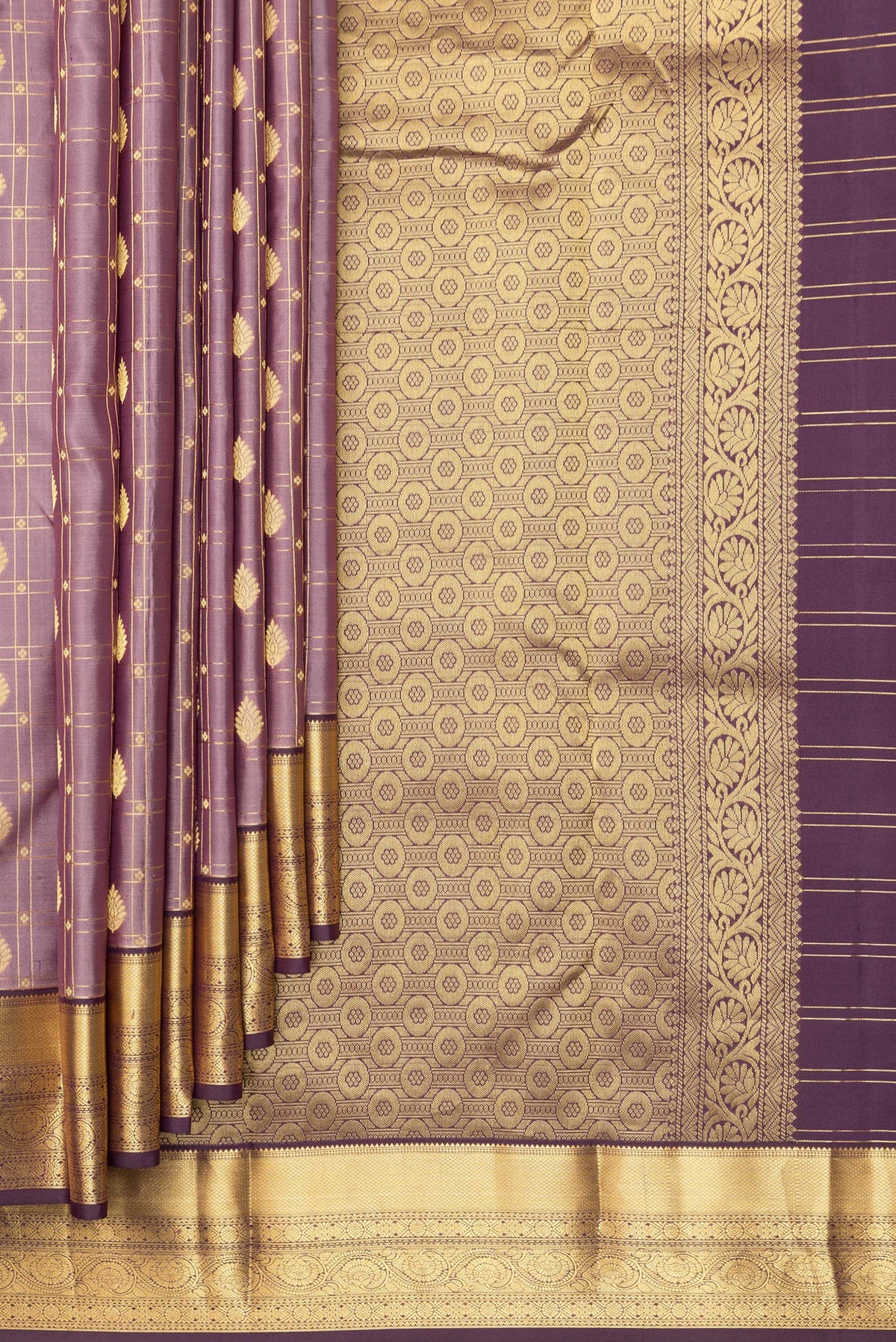 Pleats and pallu of Pure Silk Rose Gold Kanchipuram Saree with Checked design on the body and Zari Border. 