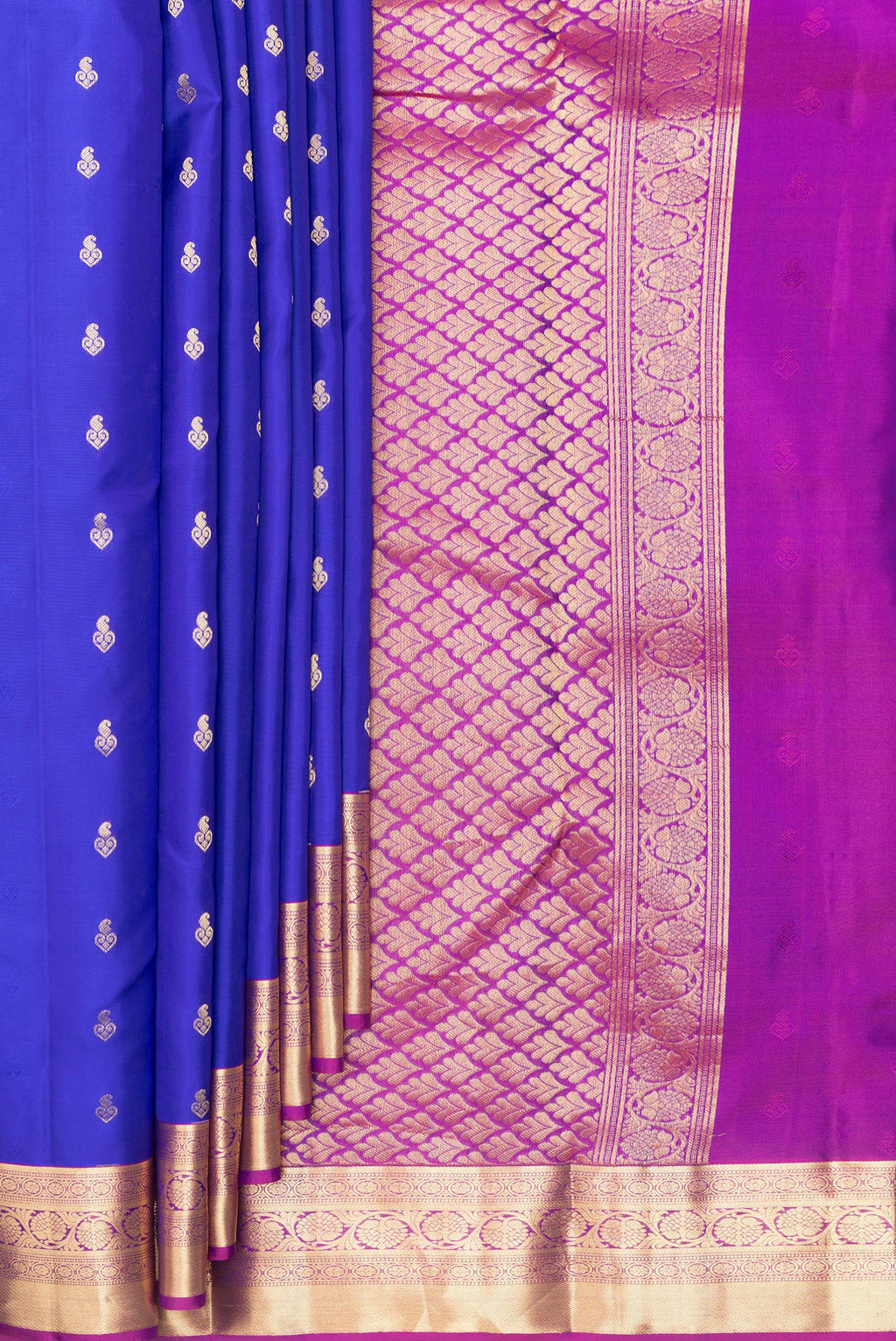 Pleats and pallu of Pure Silk Royal Blue Kanchipuram Saree with Zari Butta on the body and Zari Border. 
