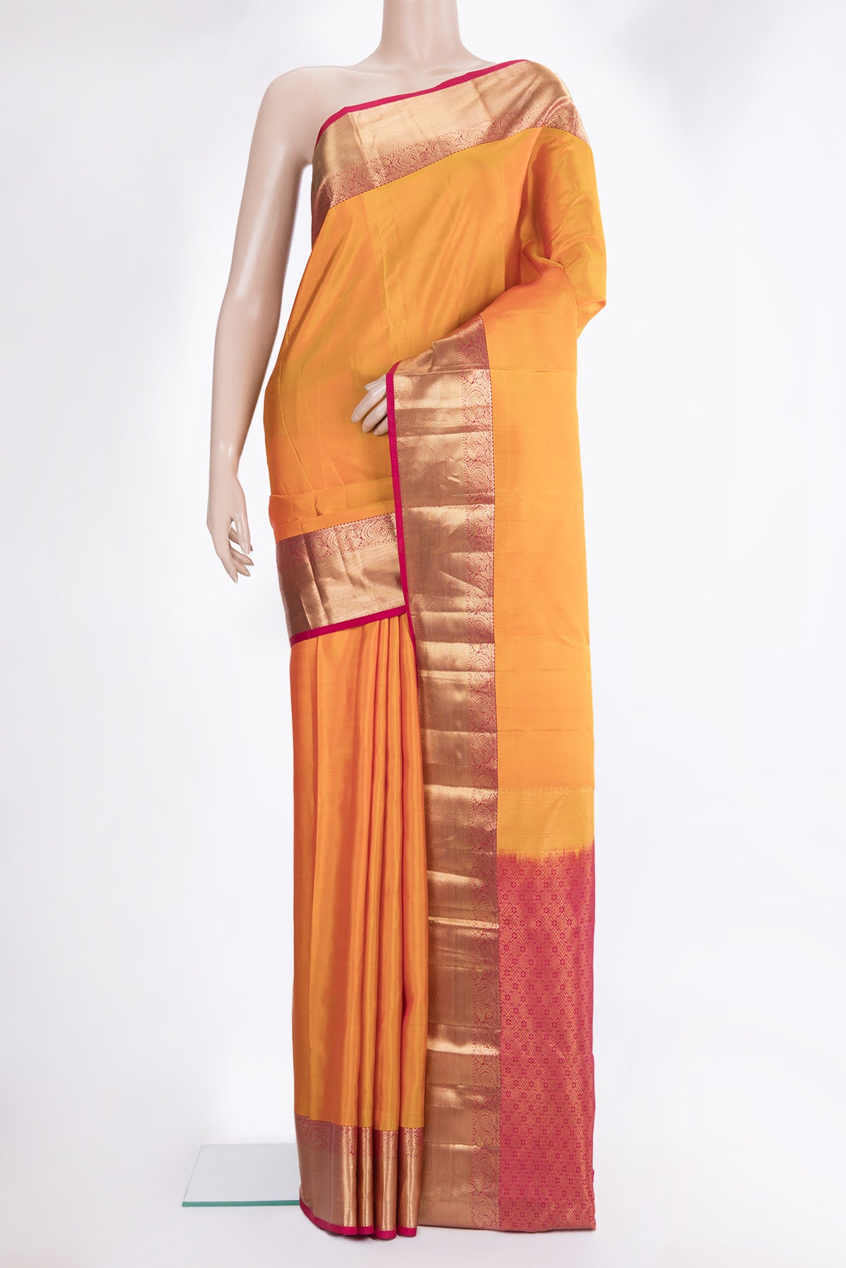 Pure Silk Yellow Kanchipuram Saree with Plain Body and Zari Border.  displayed on a mannequin