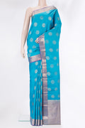 Pure Silk Sky Blue Kanchipuram Saree with Zari Butta on the body and Zari Border.  displayed on a mannequin