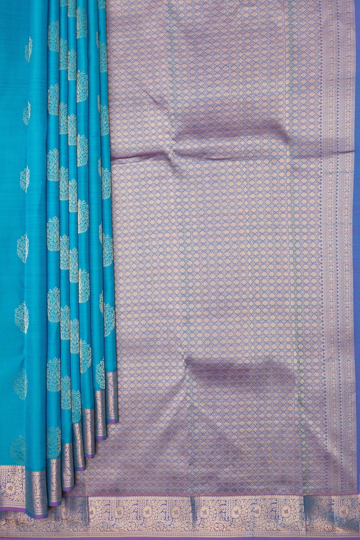 Pleats and pallu of Pure Silk Sky Blue Kanchipuram Saree with Zari Butta on the body and Zari Border. 
