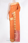 Pure Silk Orange Kanchipuram Saree with Zari Butta on the body and Zari Border.  displayed on a mannequin