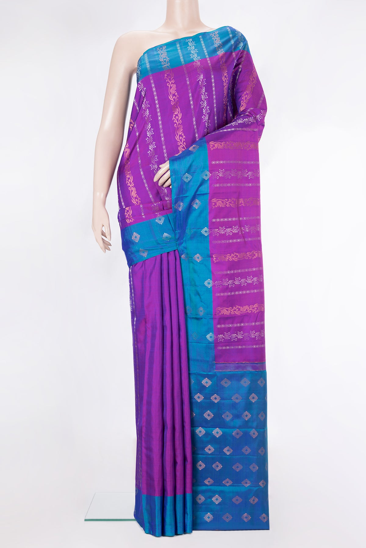 Pure Silk Purple Dual Tone Kanchipuram Saree with Zari Butta on the body and Zari Border.  displayed on a mannequin
