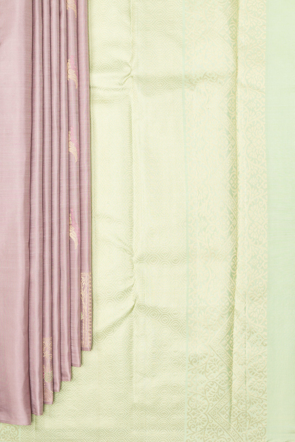 Pleats and pallu of Pure Silk Rose Gold Kanchipuram Saree with Zari Butta on the body and Without Border. 