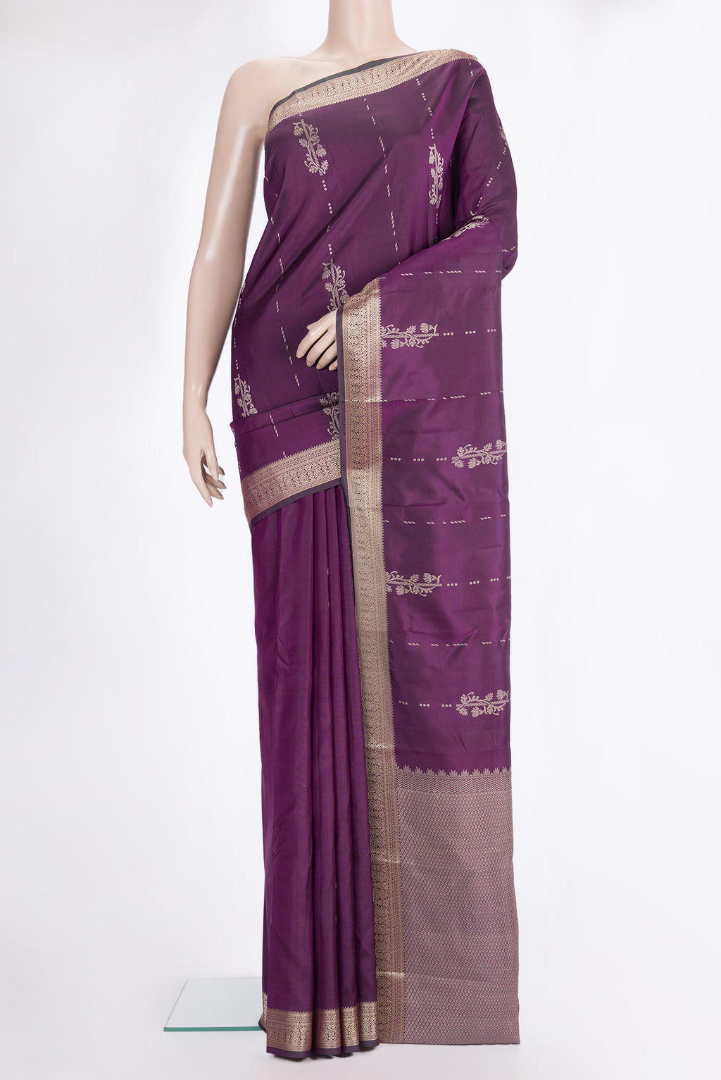 Pure Silk Purple Kanjivaram Saree with Thread Butta on the body and Thread Border.  displayed on a mannequin