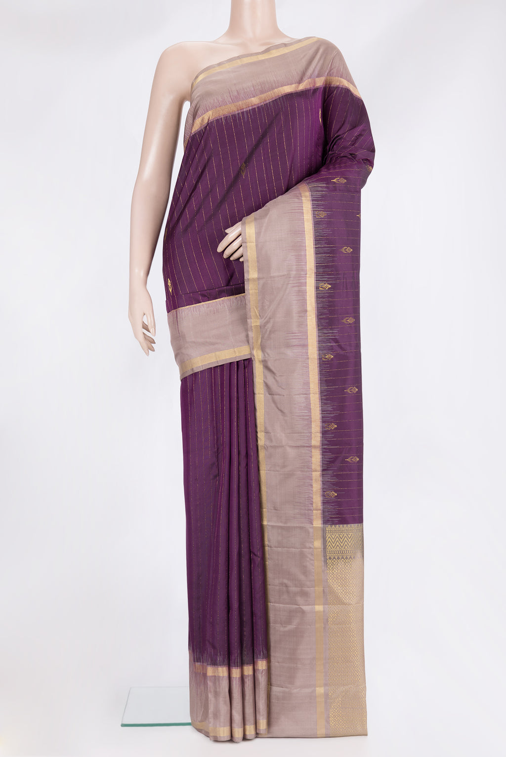 Pure Silk Purple Kanchipuram Saree with Stripes on the body and Plain Border.  displayed on a mannequin