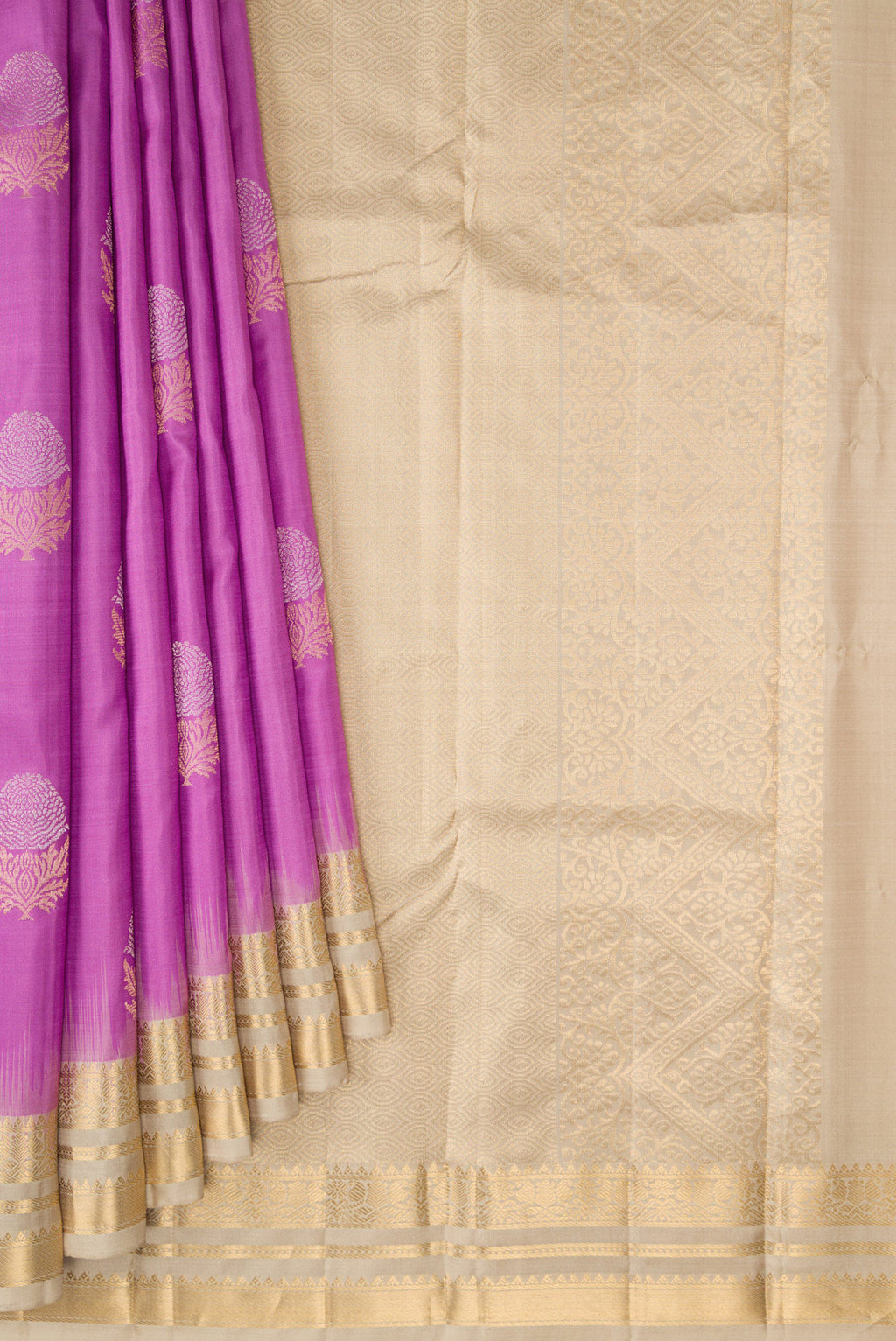 Pleats and pallu of Lavender Kanchipuram Silk Saree with Zari Butta on the body and Zari Border. 