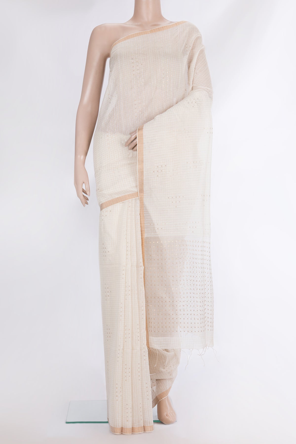 Pure Silk Beige Dual Tone Maheshwari Saree with Embroidery on the body and Zari Border.  displayed on a mannequin