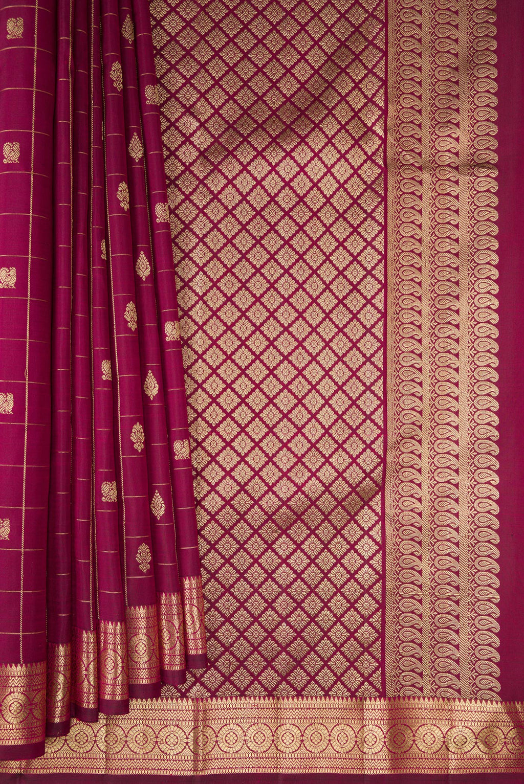 Pleats and pallu of Pure Silk Maroon Kanchipuram Saree with Checked design on the body and Zari Border. 