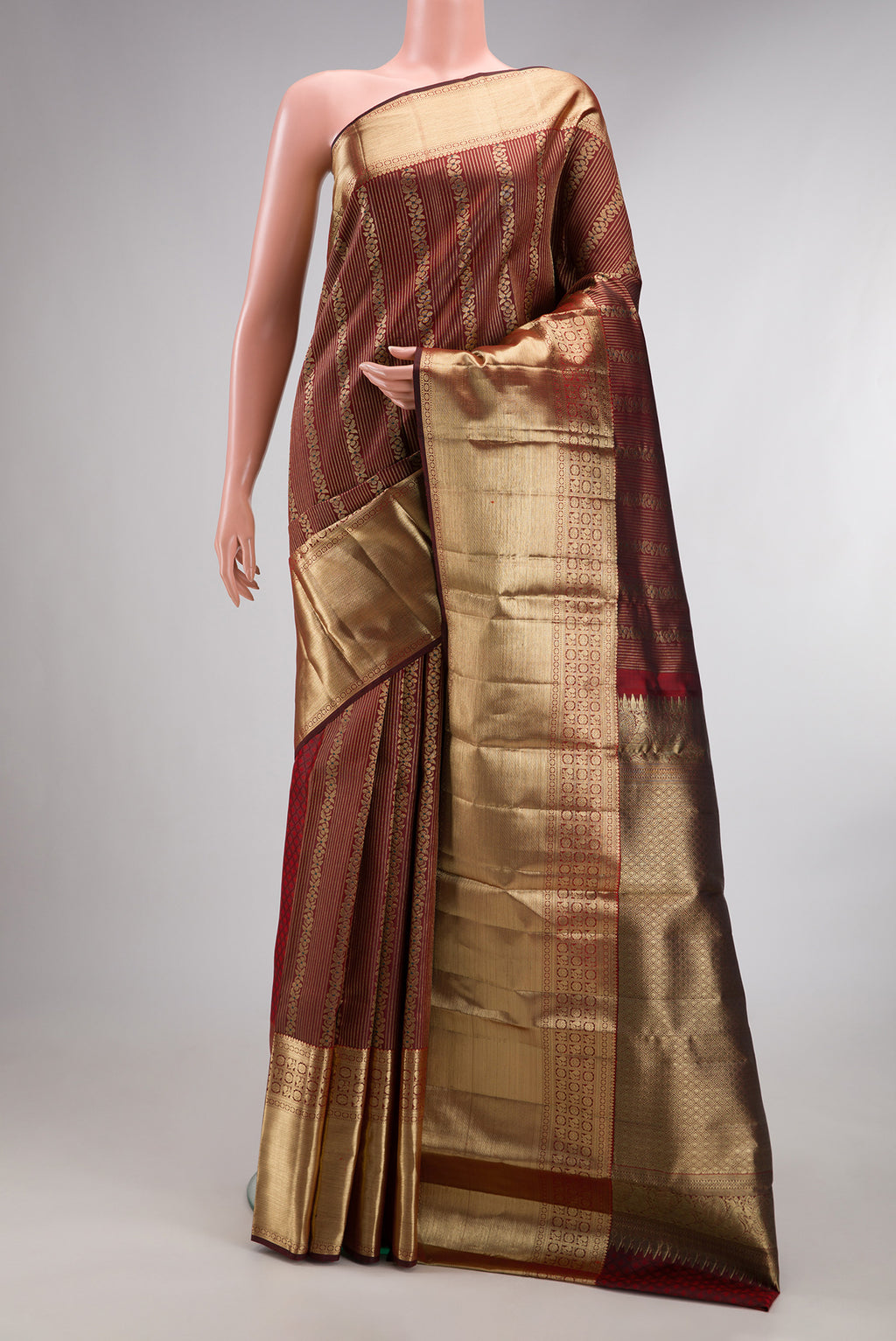 Pure Silk Maroon Dual Tone Kanchipuram Saree with Zari Brocade on the body and Fancy Border.  displayed on a mannequin