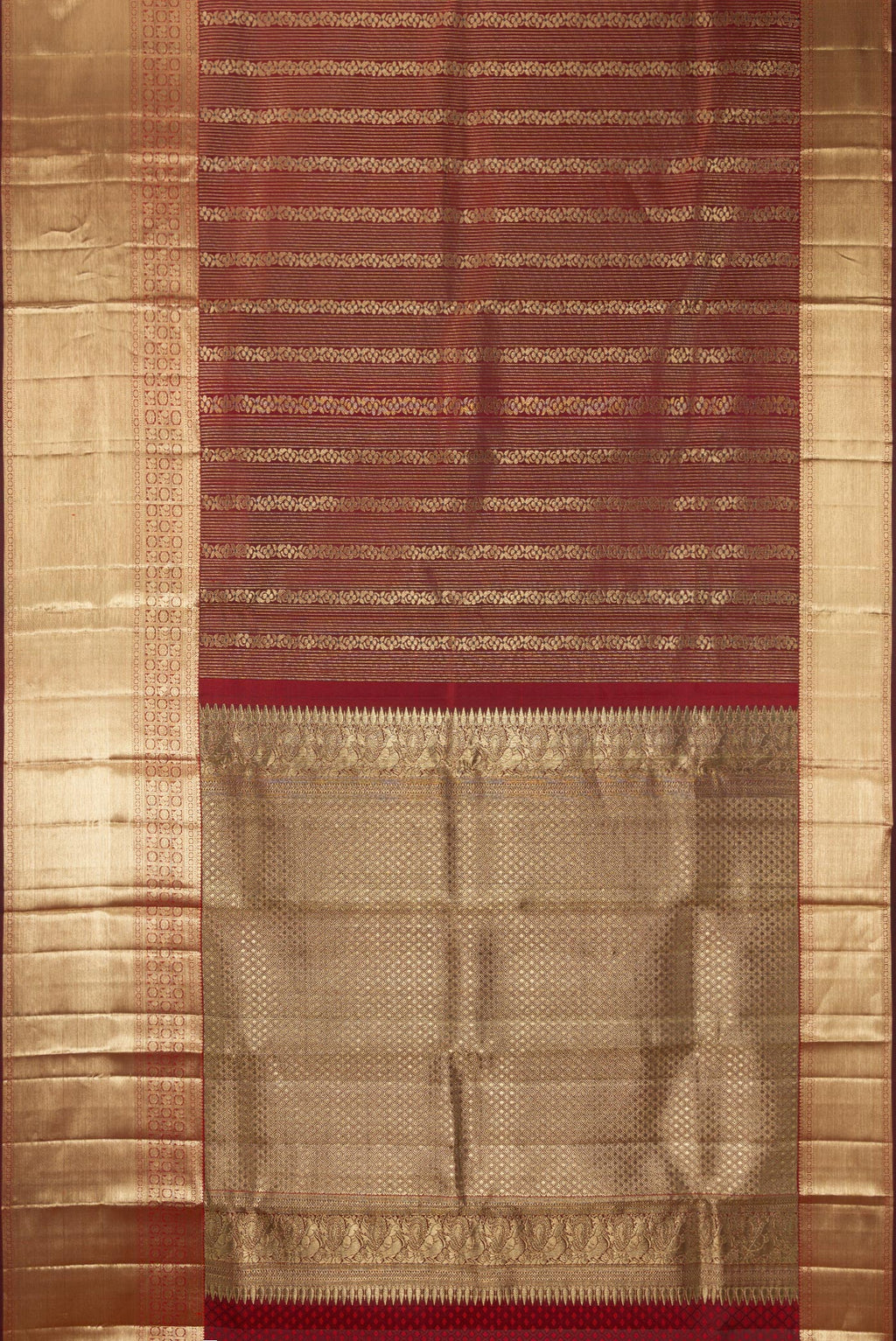 Flat view of Pure Silk Maroon Dual Tone Kanchipuram Saree with Zari Brocade on the body and Fancy Border. 
