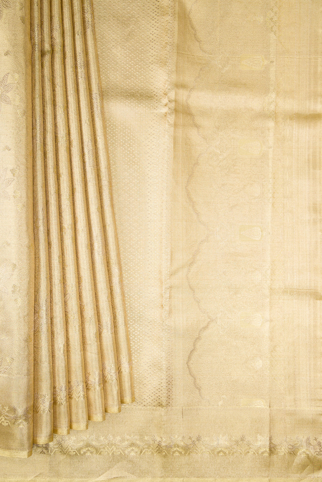 Pleats and pallu of Gold with Red Dual Tone Kanjivaram Tissue Saree with Zari Brocade on the body and Fancy Border. 