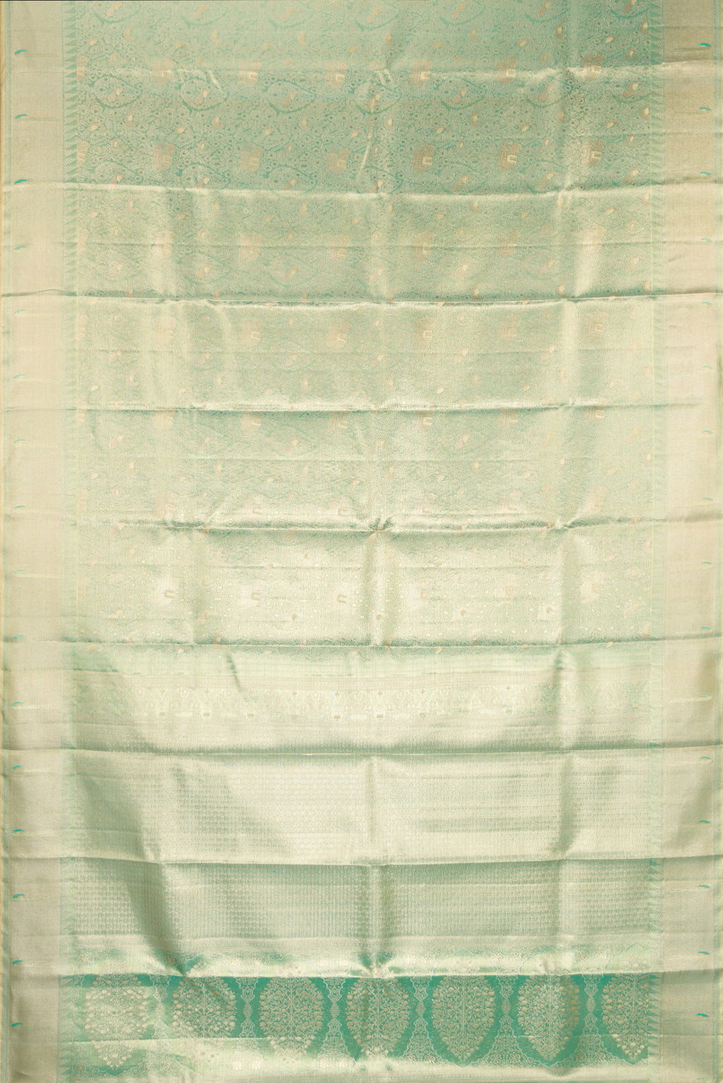 Flat view of Pista Green Dual Tone Kanjivaram Tissue Saree with Zari Brocade on the body and Fancy Border. 
