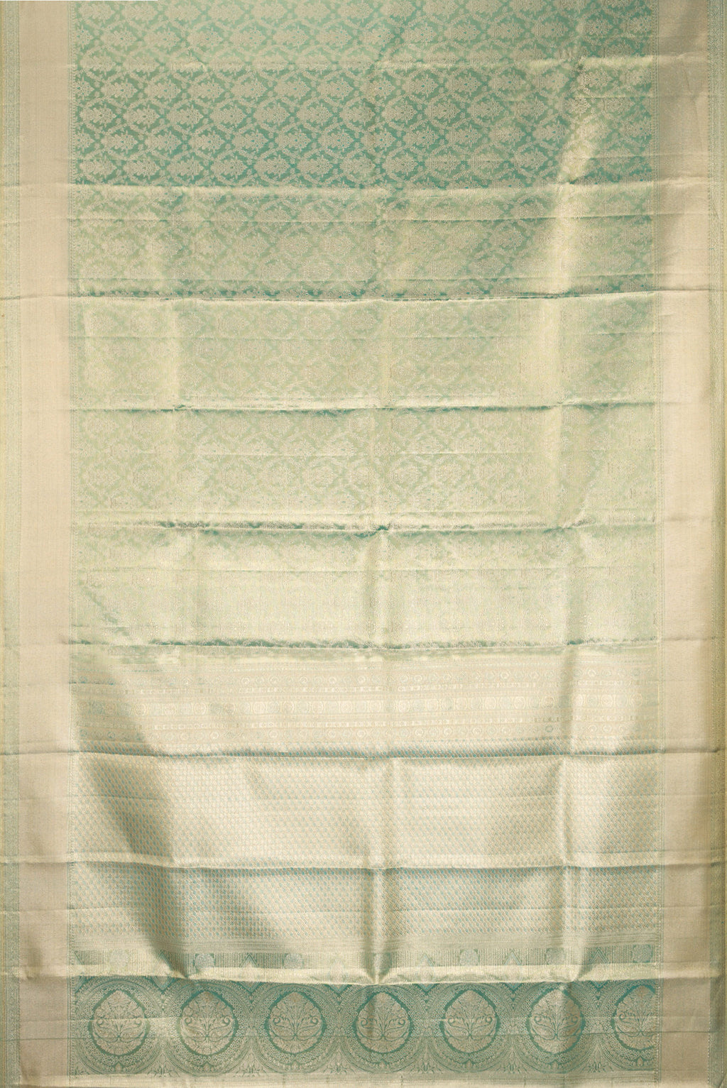 Flat view of Light Green Dual Tone Kanjivaram Tissue Saree with Zari Brocade on the body and Fancy Border. 