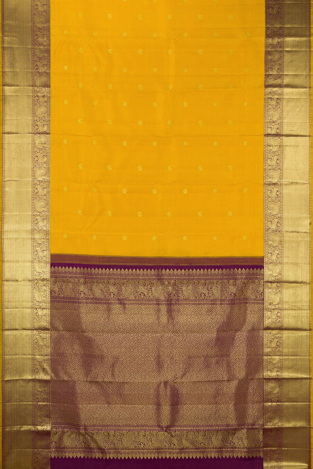 Flat view of Pure Silk Mustard Kanjivaram Saree with Zari Butta on the body and Zari Border. 