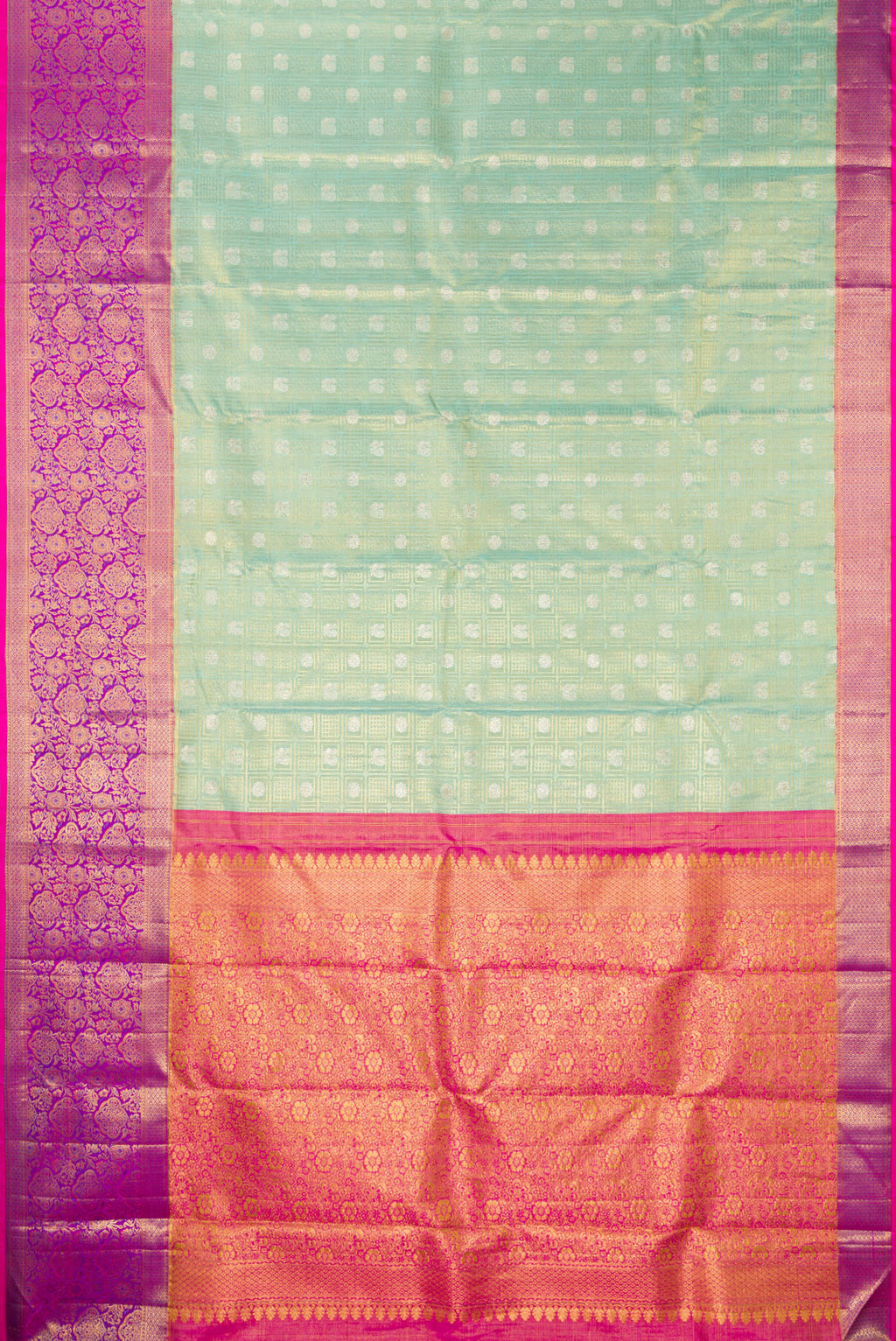 Flat view of Sea Green Dual Tone Kanchipuram Tissue Saree with Zari Brocade on the body and Fancy Border. 