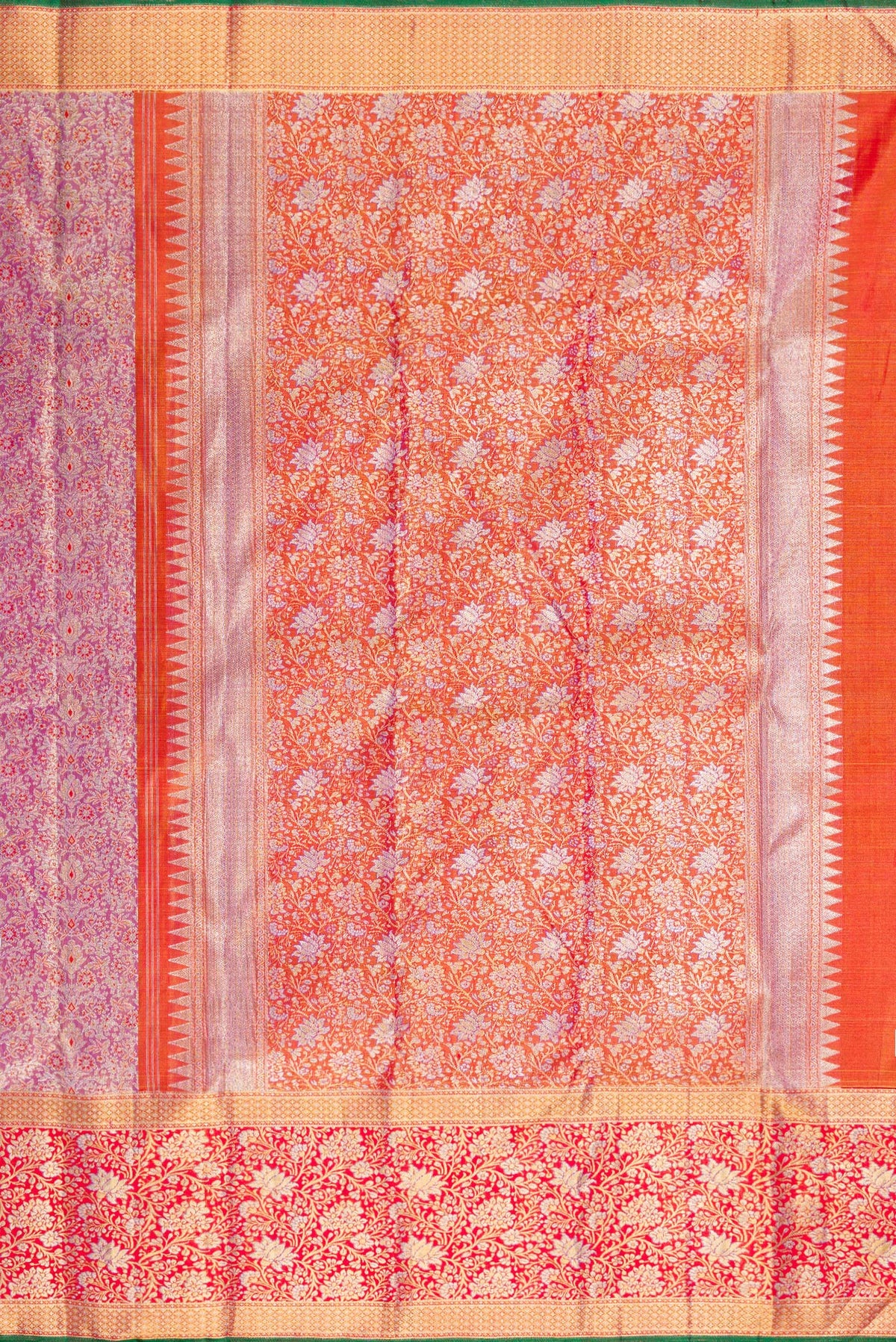 Close up image of the pallu of Pure Silk Pure Zari Purple Dual Tone Kanchipuram Tissue Saree with Zari Brocade on the body and Zari Border. 