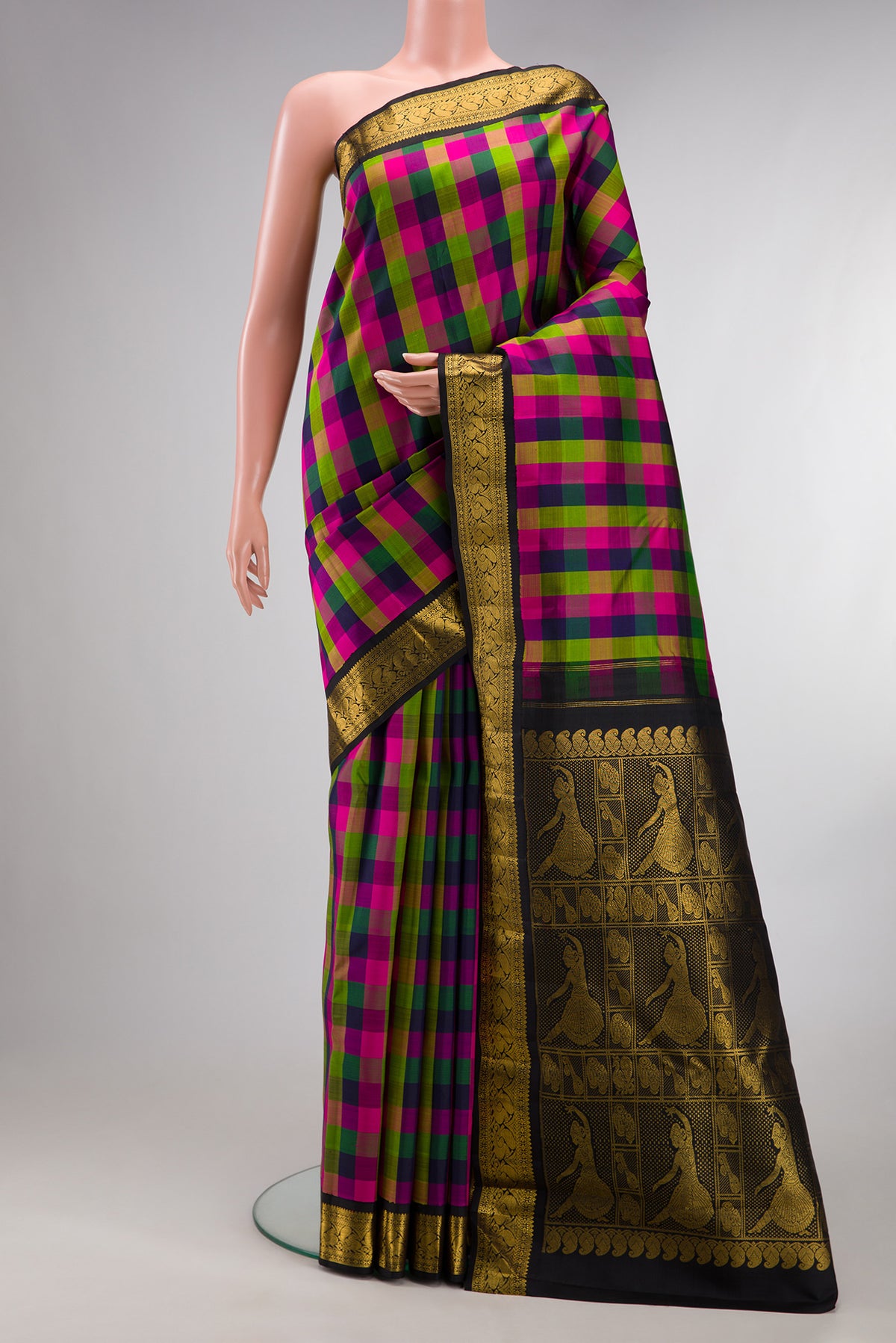 Pure Silk Multi Color Kanjivaram Saree with Checked design on the body and Zari Border.  displayed on a mannequin