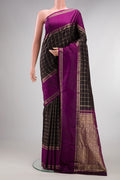 Pure Silk Coffee Brown Kanjivaram Saree with Checked design on the body and Zari Border.  displayed on a mannequin