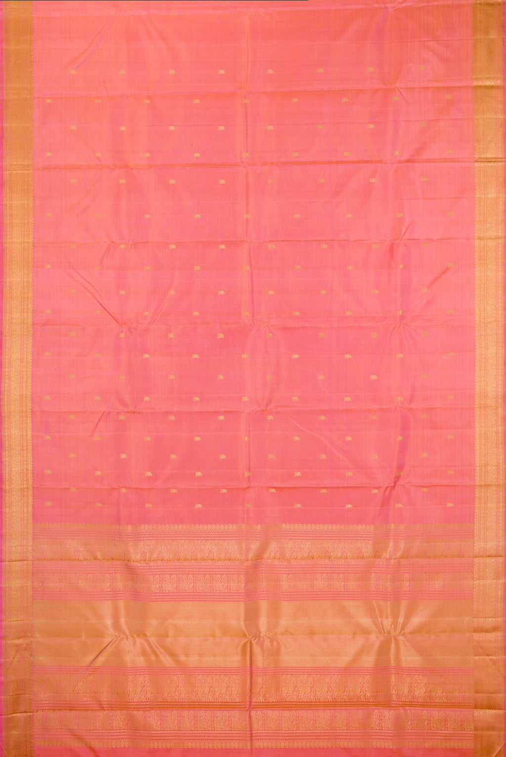 Flat view of Pure Silk Pinkish Yellow Dual Tone Kanjivaram Saree with Thread Butta on the body and Thread Border. 