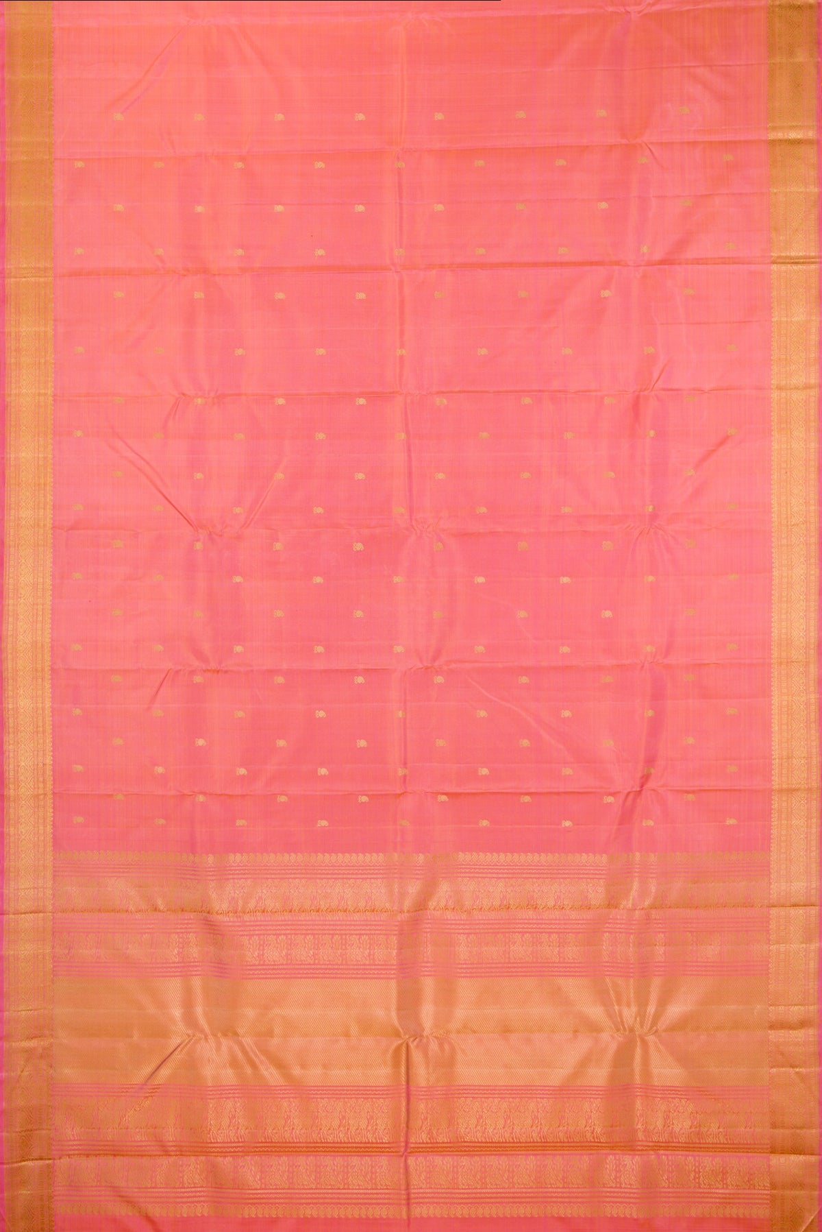 Flat view of Pure Silk Pinkish Yellow Dual Tone Kanjivaram Saree with Thread Butta on the body and Thread Border. 