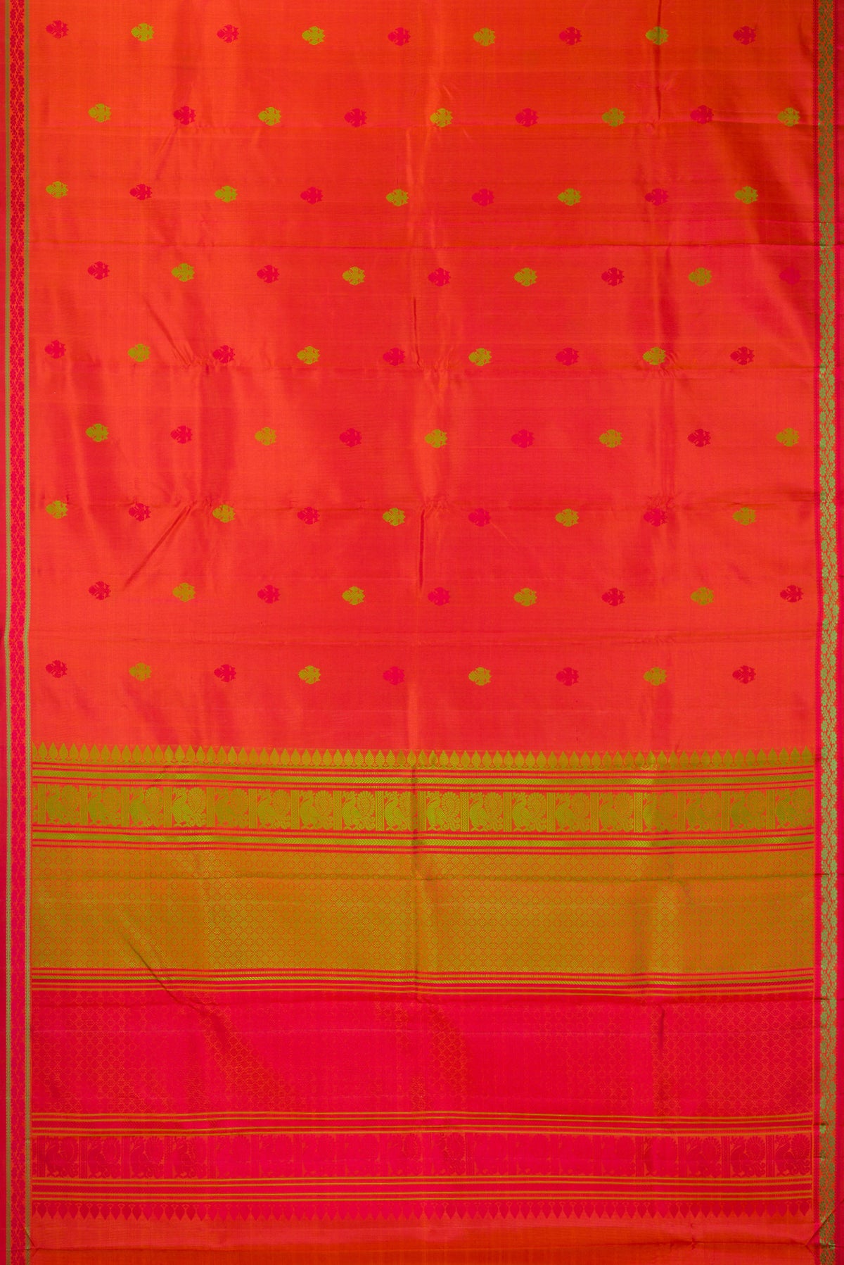 Flat view of Pure Silk Orange Kanchipuram Saree with Thread Butta on the body and Thread Border. 