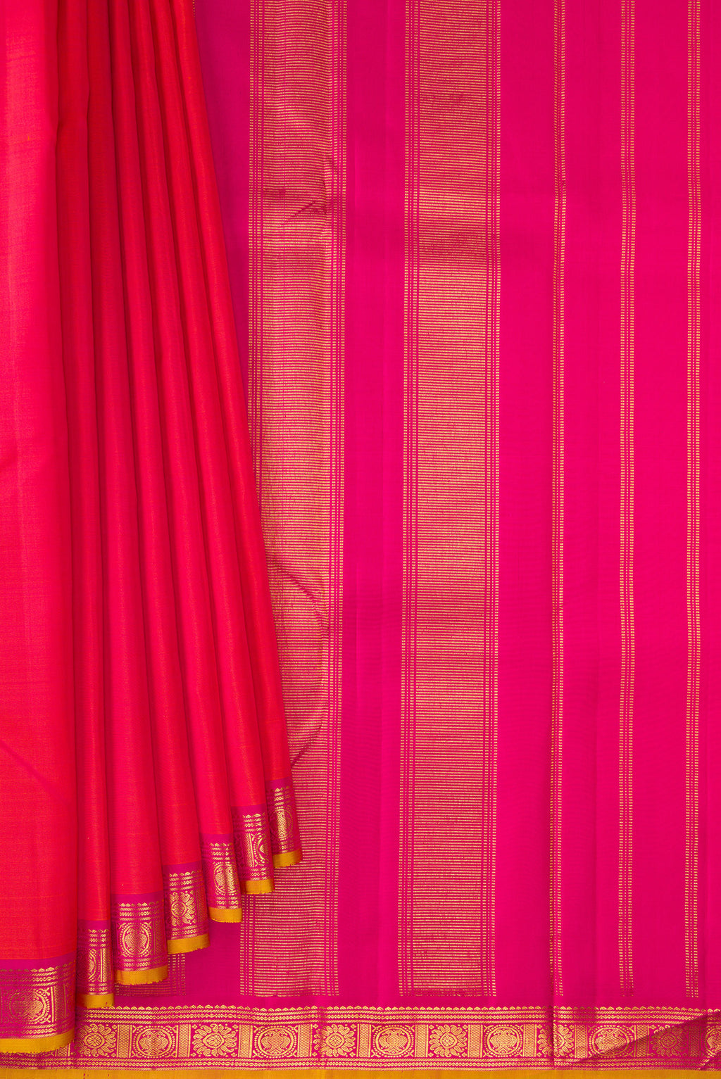 Pleats and pallu of Pure Silk Brick Orange Dual Tone Kanjivaram Saree with Plain Body and Zari Border. 