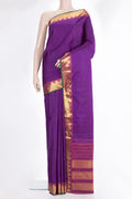 Pure Silk Purple Kanchipuram Saree with Plain Body and Zari Border.  displayed on a mannequin