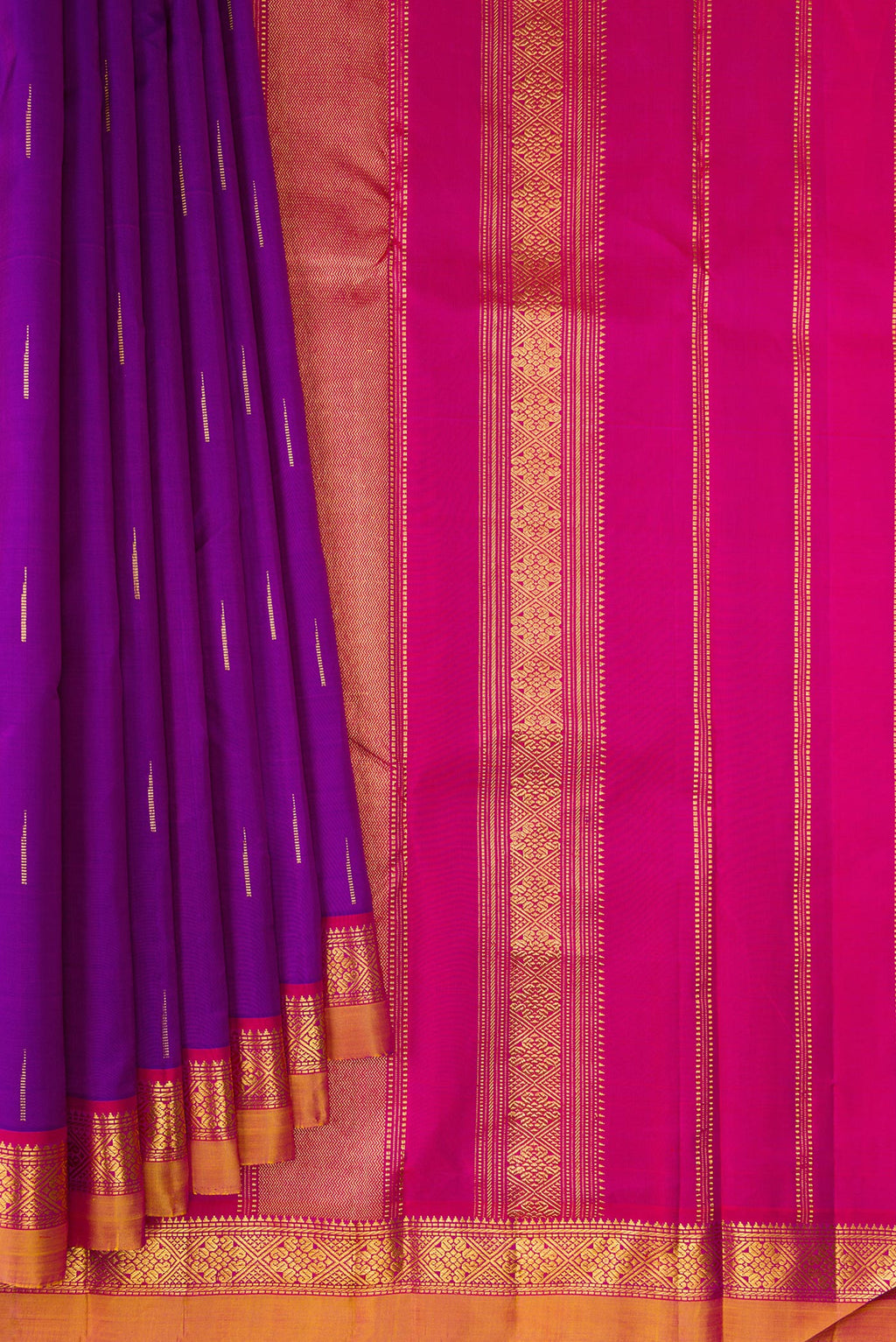 Pleats and pallu of Pure Silk Purple Kanchipuram Saree with Zari Butta on the body and Zari Border. 