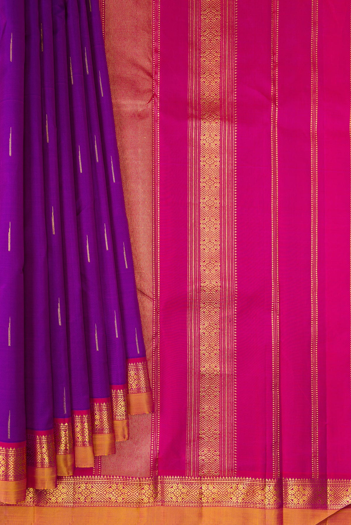 Pleats and pallu of Pure Silk Purple Kanchipuram Saree with Zari Butta on the body and Zari Border. 