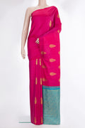 Pure Silk Dark Pink Kanchipuram Saree with Zari Butta on the body and Without Border.  displayed on a mannequin