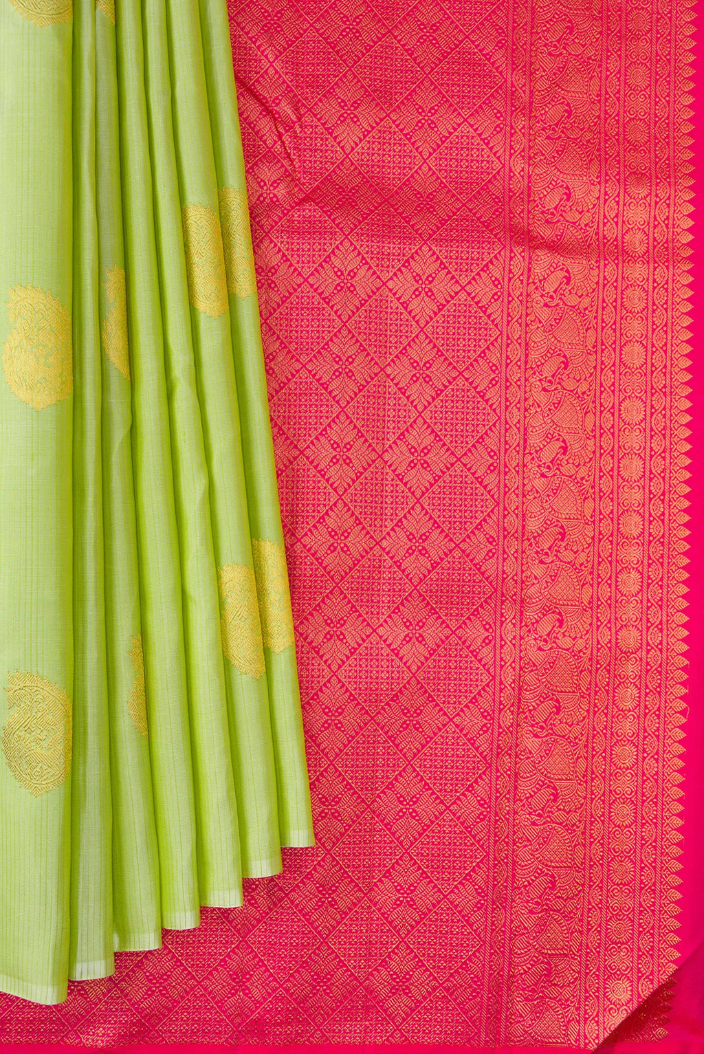 Pleats and pallu of Pure Silk Pista Green Kanchipuram Saree with Zari Butta on the body and Without Border. 