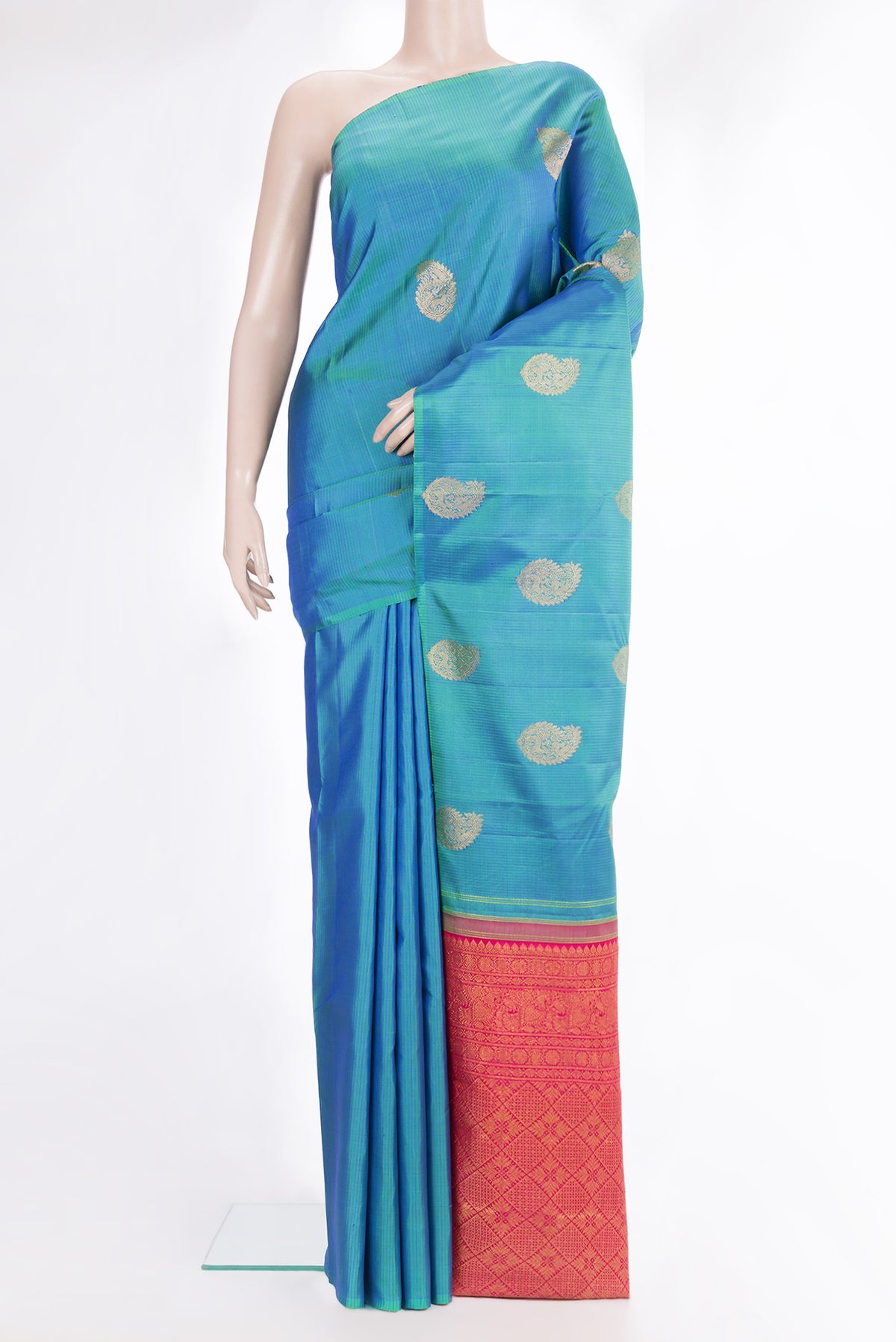 Pure Silk Peacock Blue Dual Tone Kanchipuram Saree with Zari Butta on the body and Without Border.  displayed on a mannequin