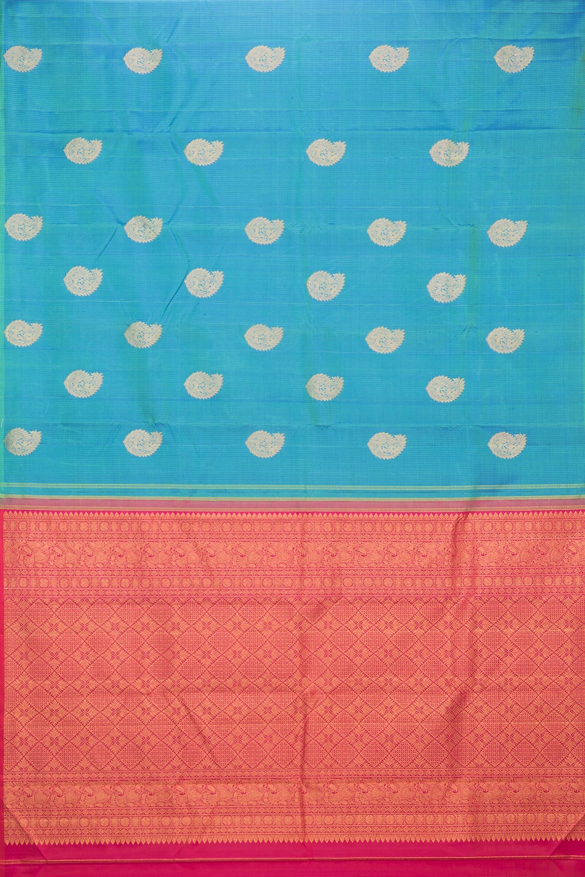 Flat view of Pure Silk Peacock Blue Dual Tone Kanchipuram Saree with Zari Butta on the body and Without Border. 