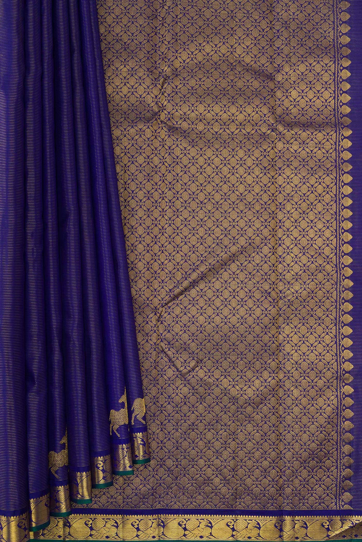 Pleats and pallu of Pure Silk Royal Blue Kanchipuram Saree with Stripes on the body and Fancy Border. 