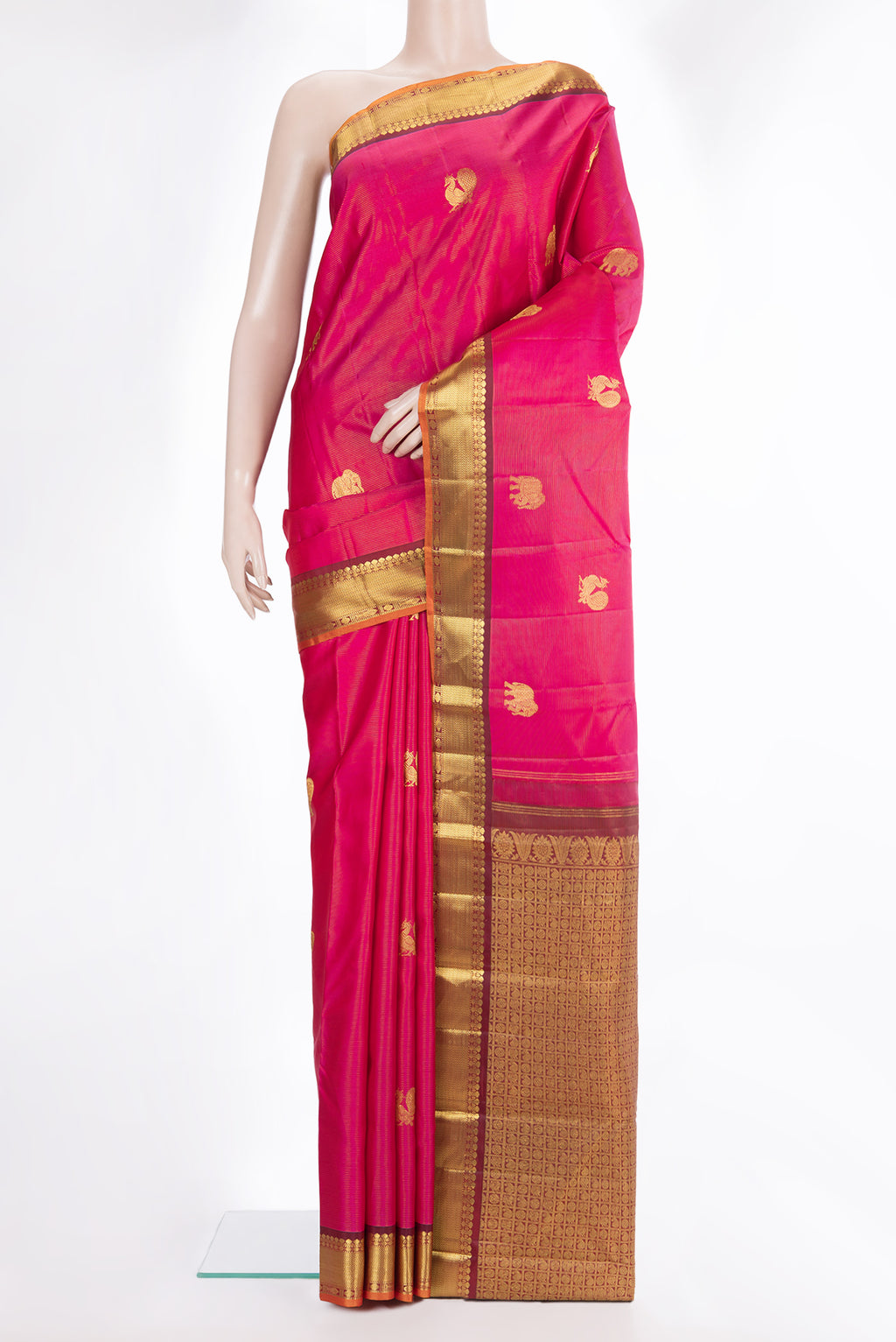 Pure Silk Dark Pink Kanchipuram Saree with Zari Butta on the body and Zari Border.  displayed on a mannequin