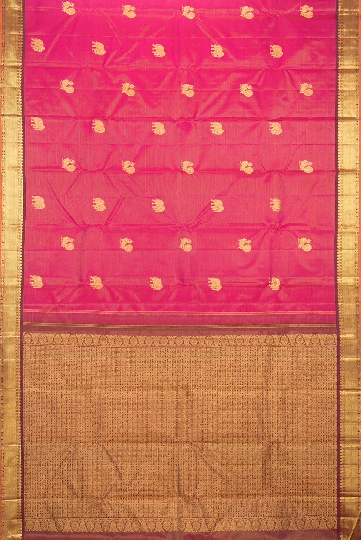 Flat view of Pure Silk Dark Pink Kanchipuram Saree with Zari Butta on the body and Zari Border. 