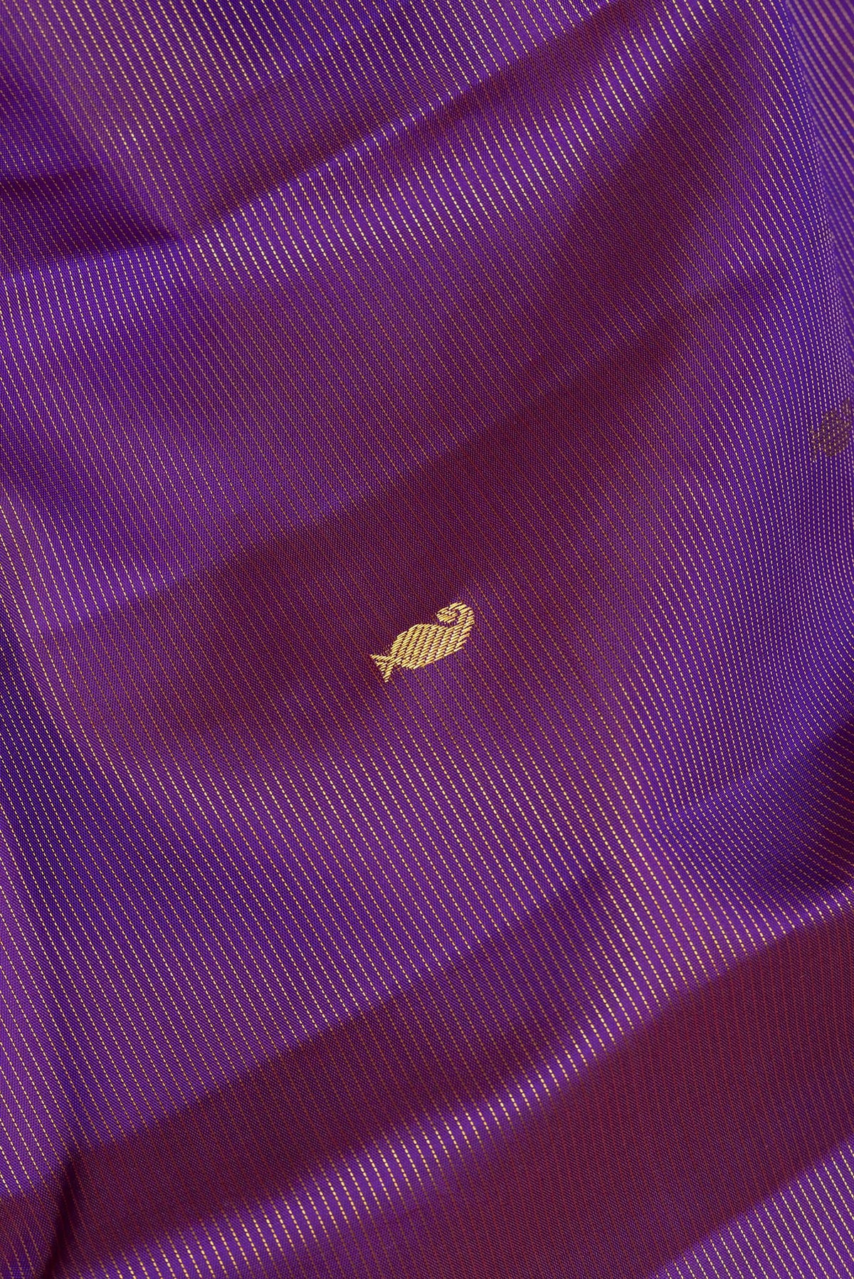 Close up of Pure Silk Purple Kanchipuram Saree with Stripes on the body and Zari Border.  displaying folds