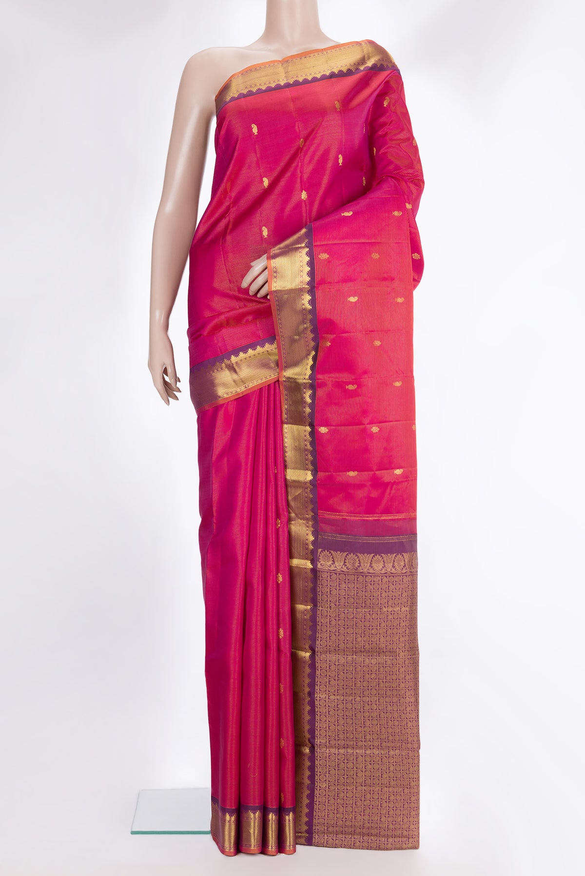 Pure Silk Pink Dual Tone Kanchipuram Saree with Stripes on the body and Zari Border.  displayed on a mannequin