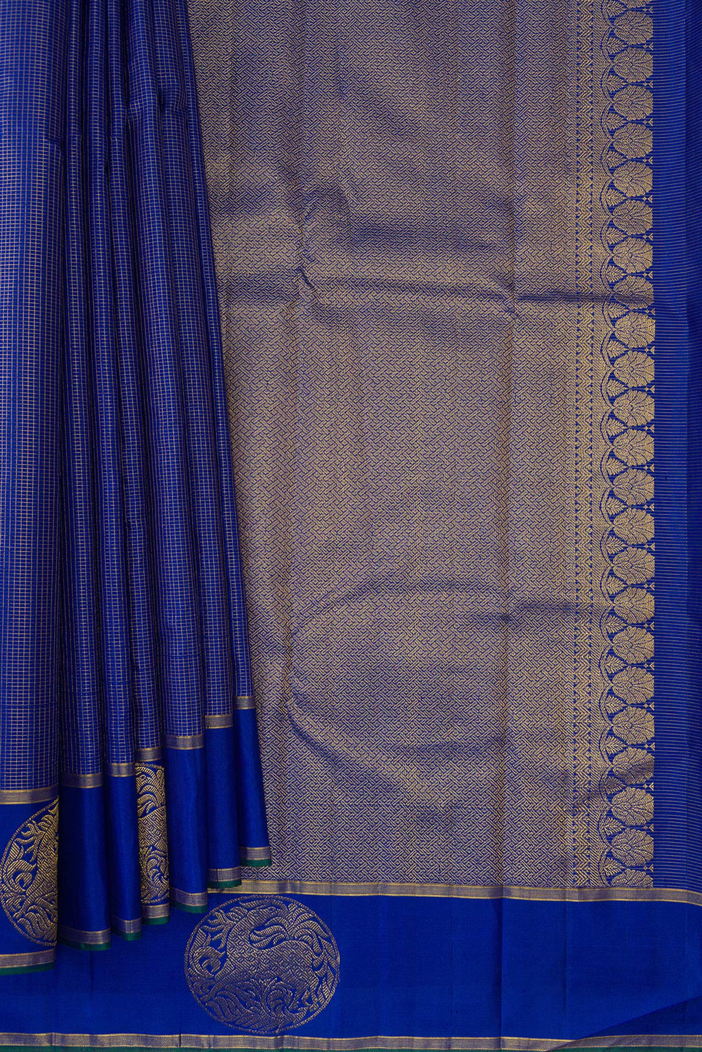 Pleats and pallu of Pure Silk Royal Blue Kanchipuram Saree with Checked design on the body and Fancy Border. 