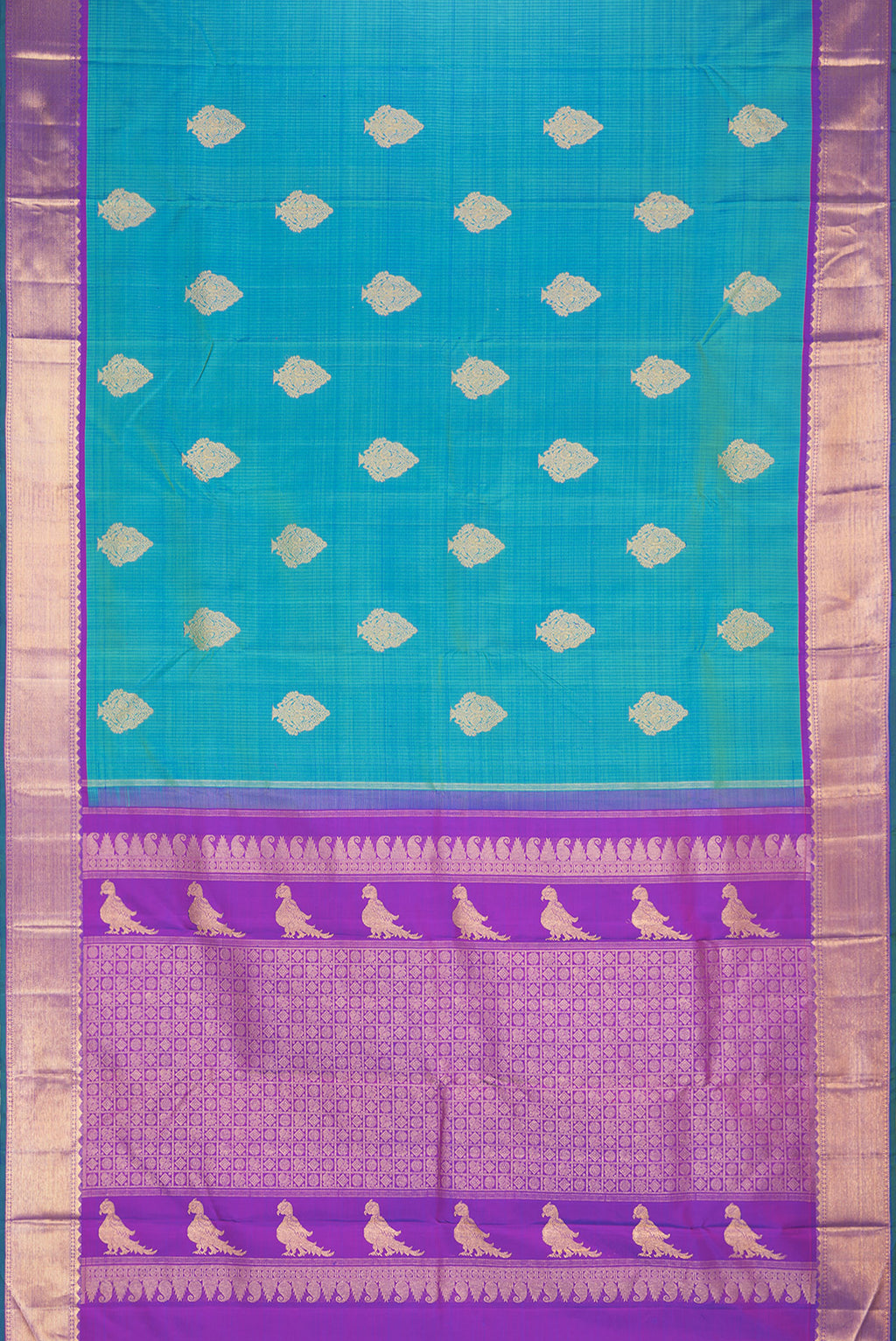 Flat view of Pure Silk Peacock Blue Kanjivaram Saree with Stripes on the body and Zari Border. 