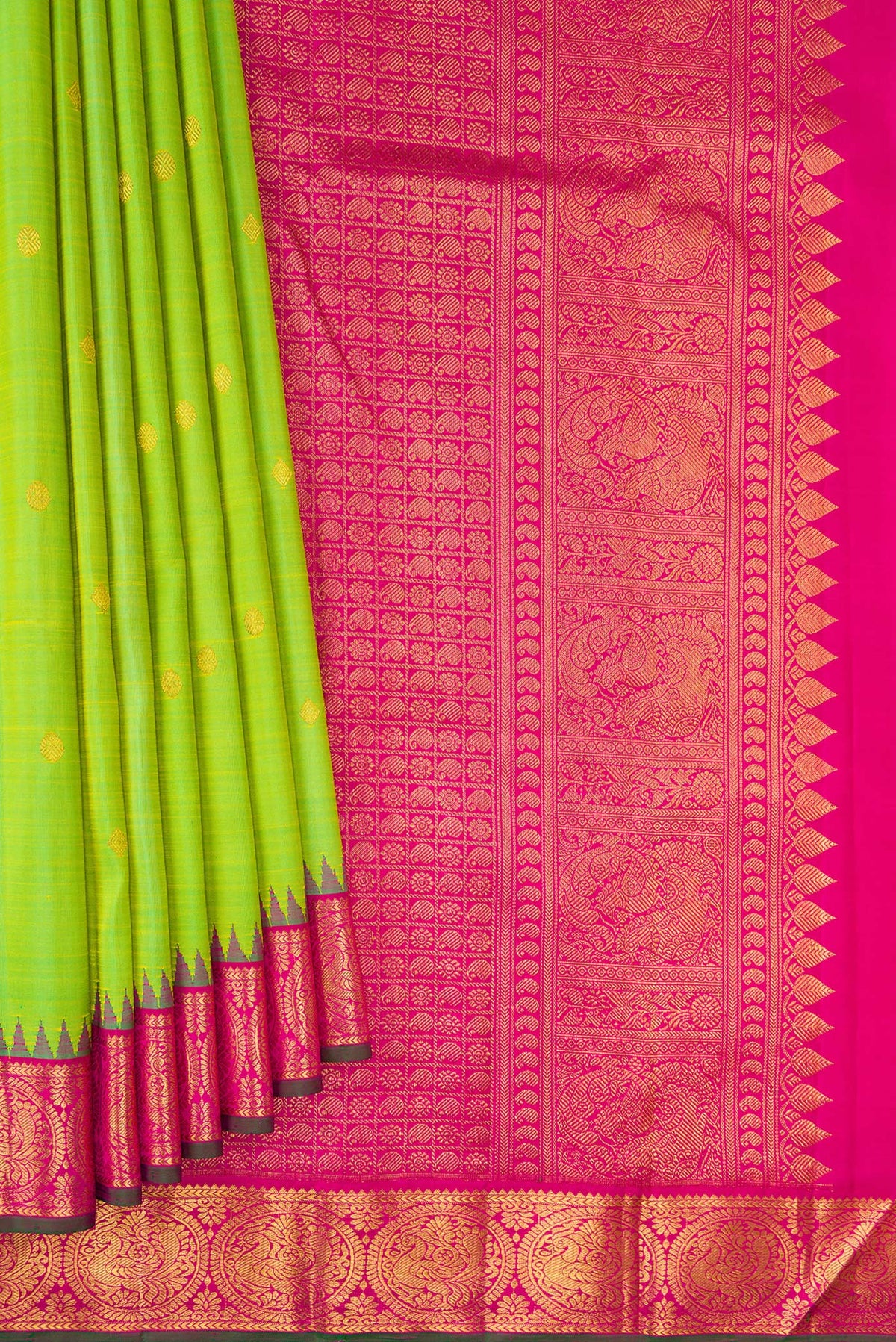 Pleats and pallu of Pure Silk Parrot Green Kanjivaram Saree with Zari Butta on the body and Temple Border. 